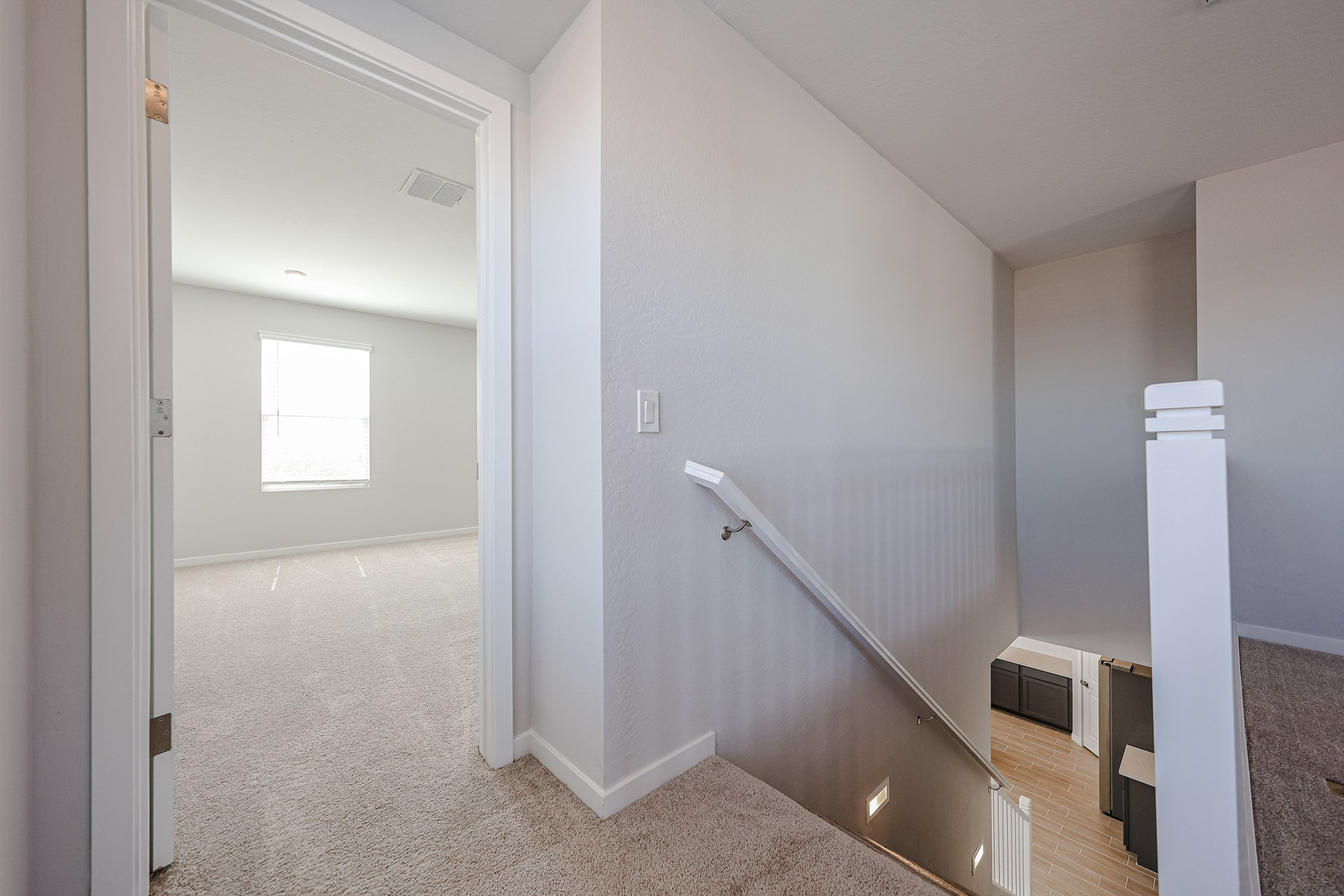 A room with a staircase.