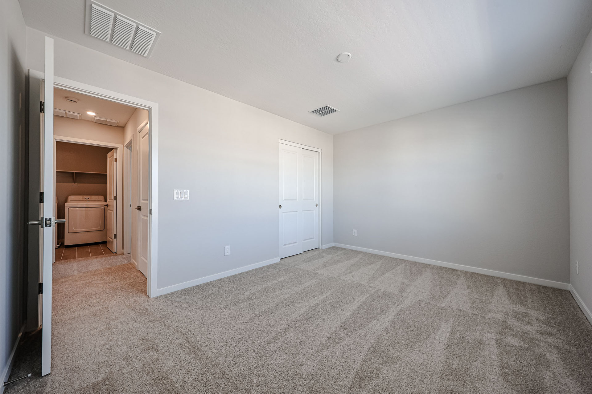 A room with white doors.
