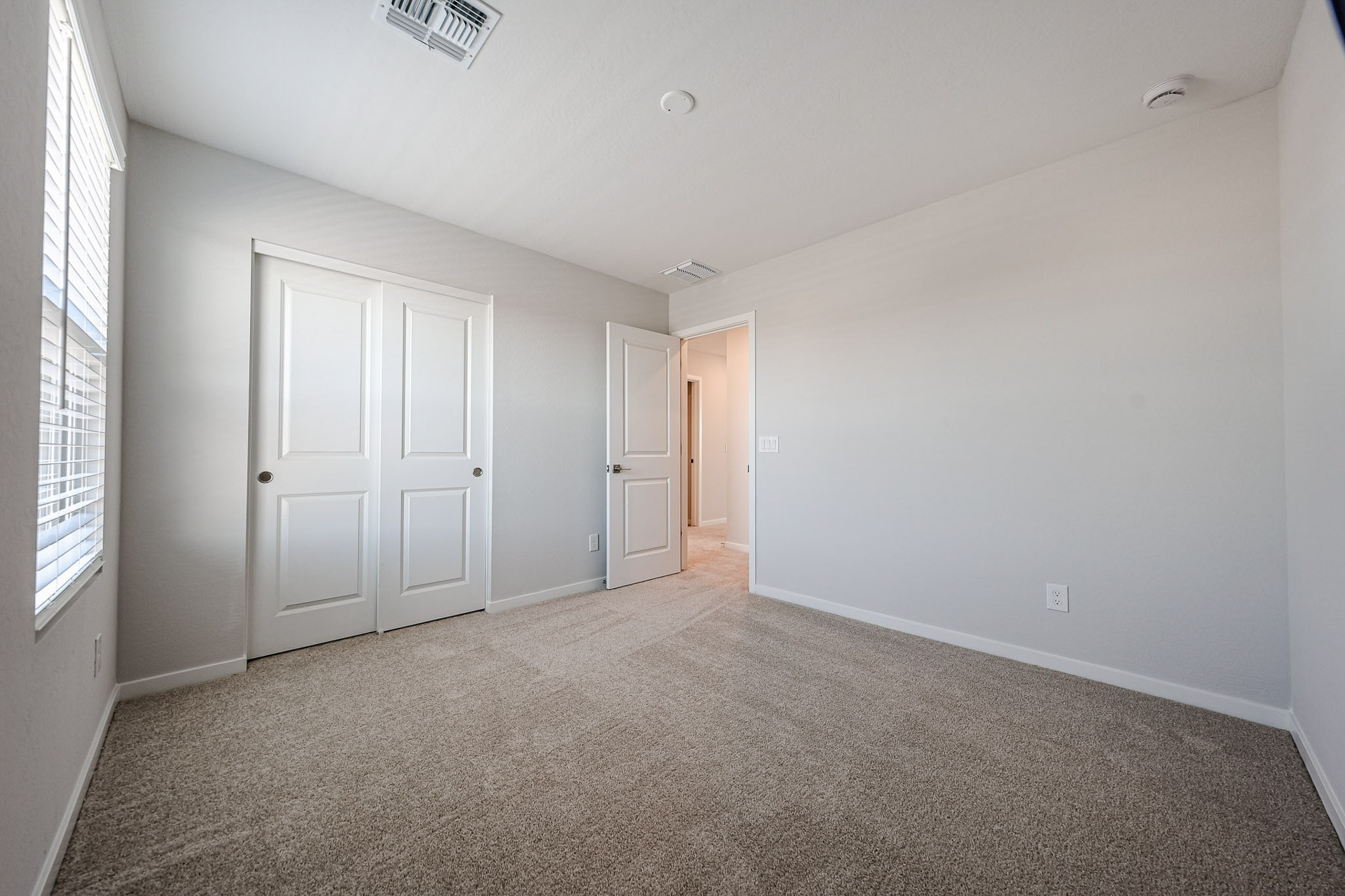 A room with white doors.