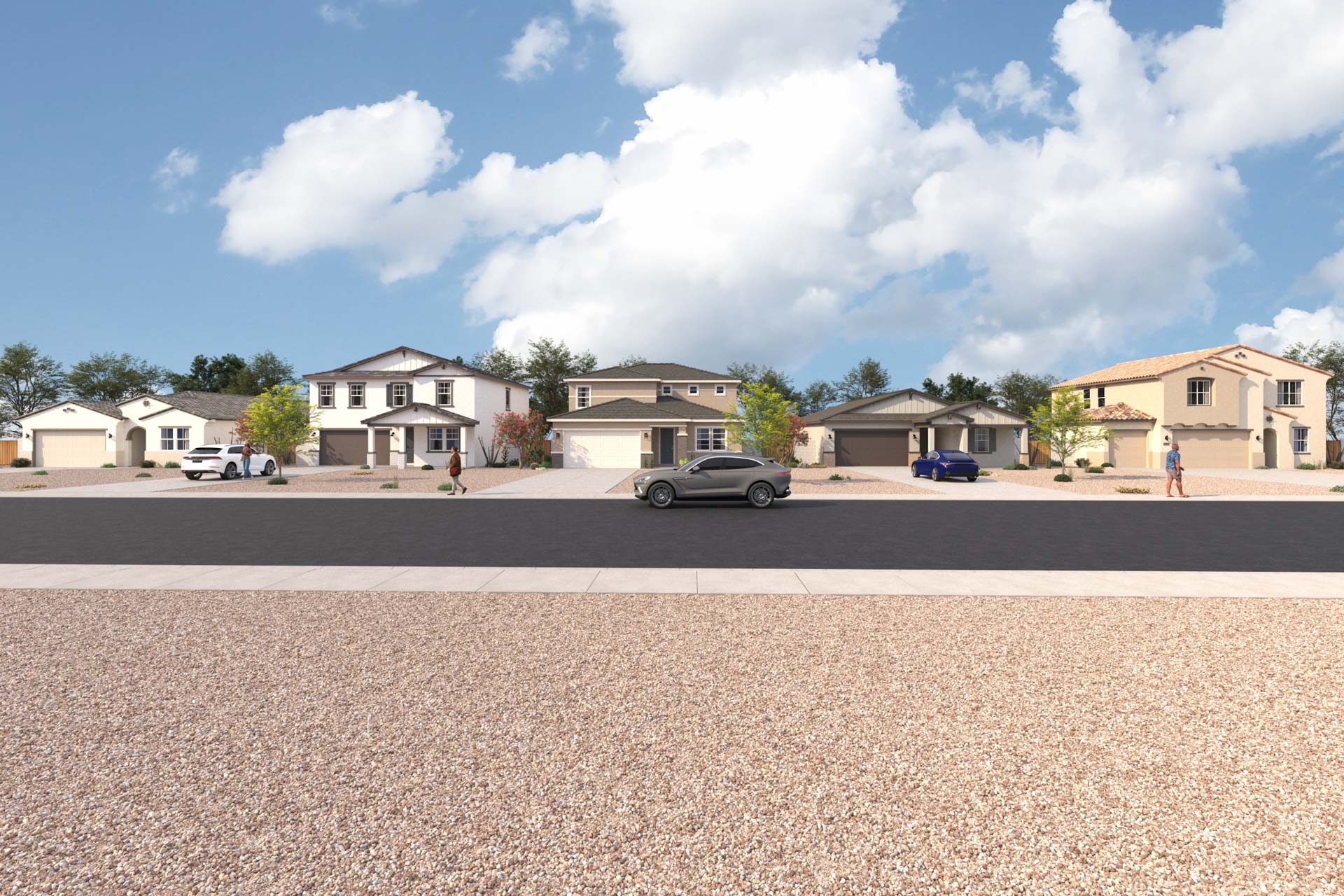 A group of houses with cars parked in front of them.