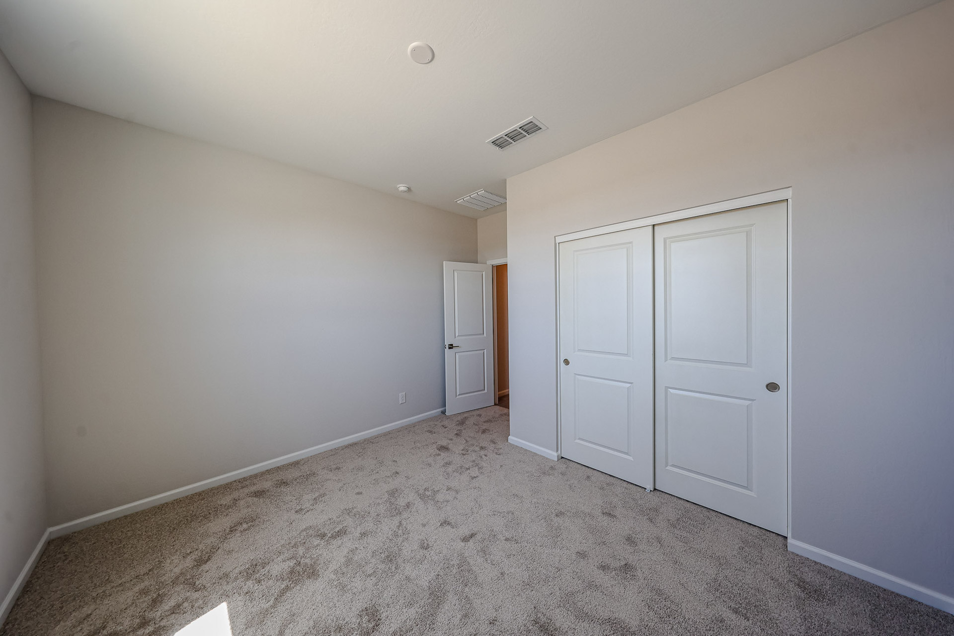 A room with white doors.