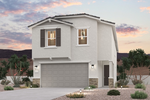 A white house with a garage.