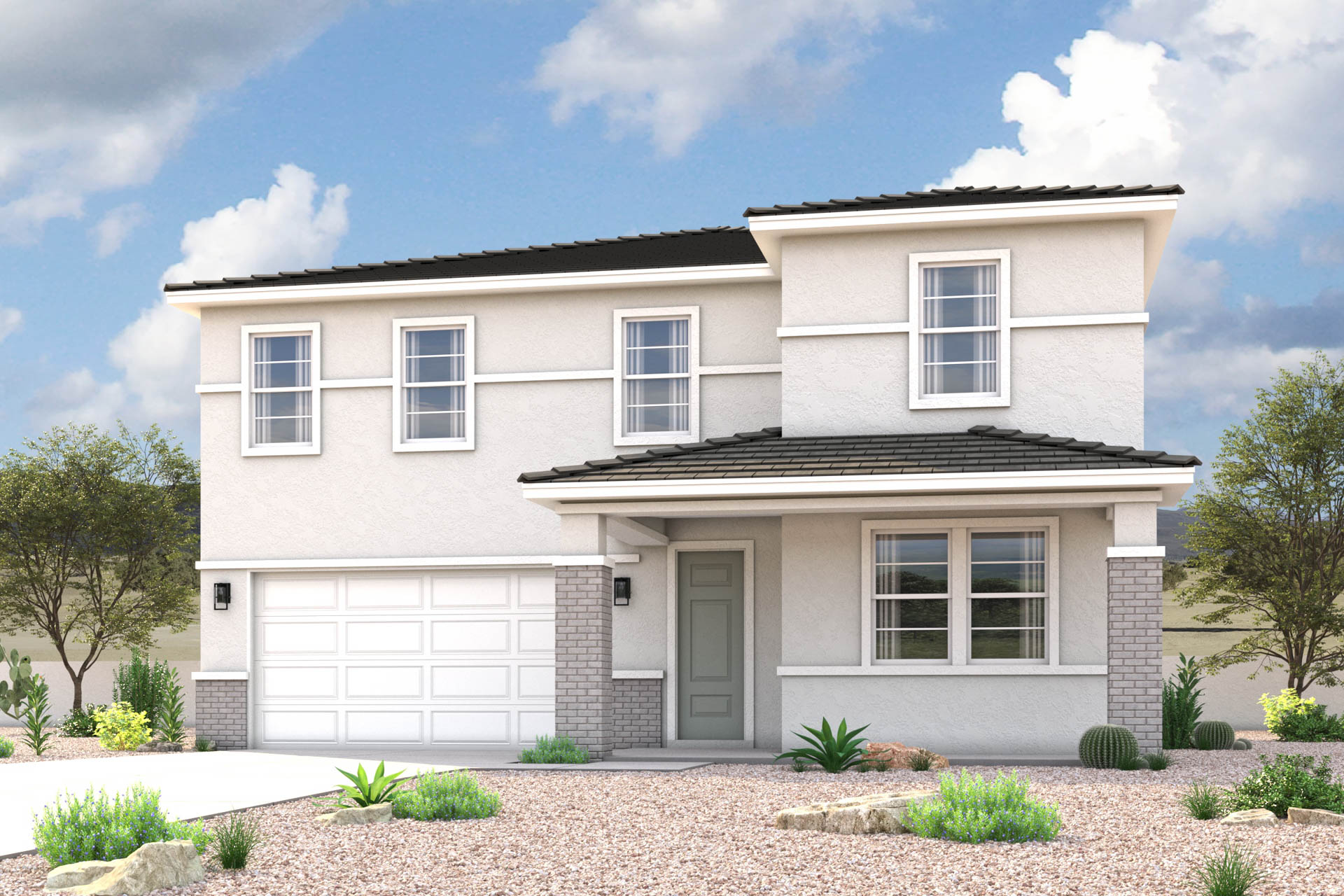 A white house with a garage.
