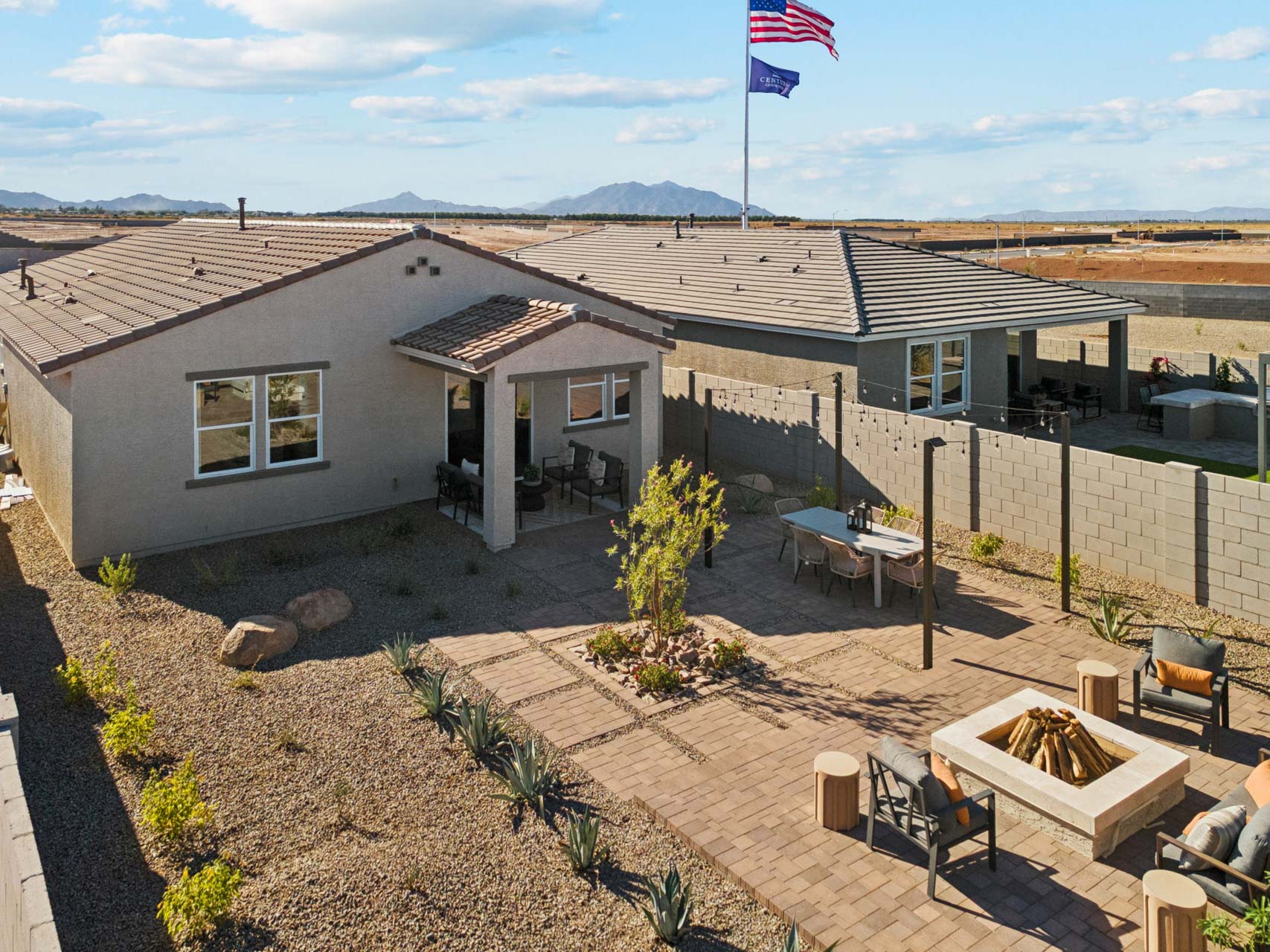 A house with a flag on the roof.