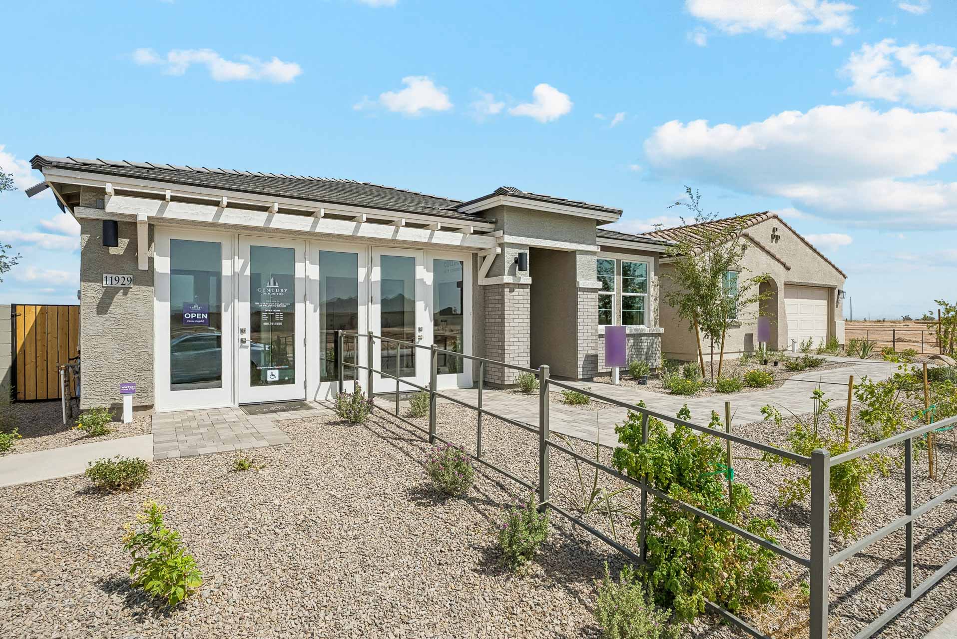 A house with a fence around it.