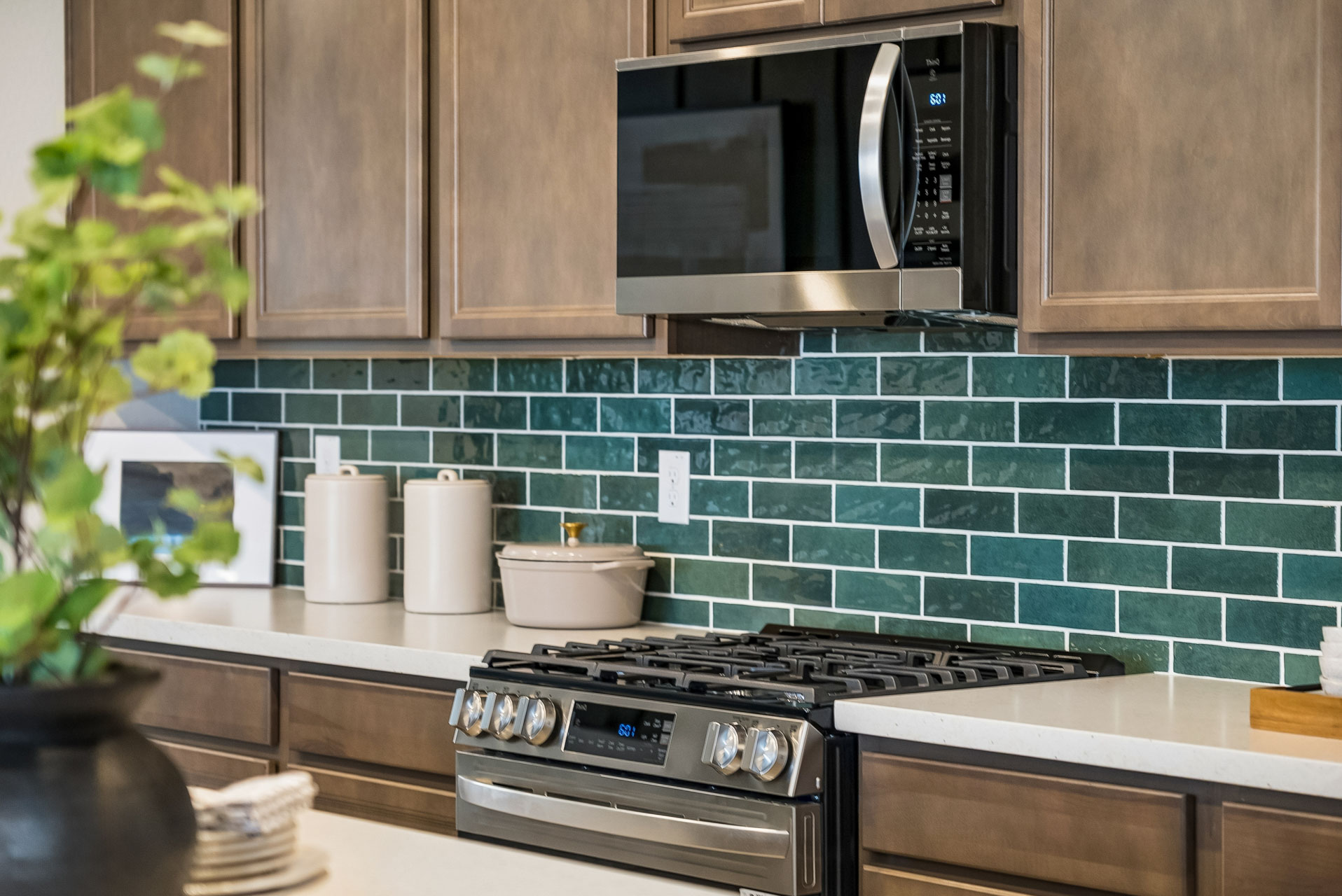 A kitchen with a stove and oven.