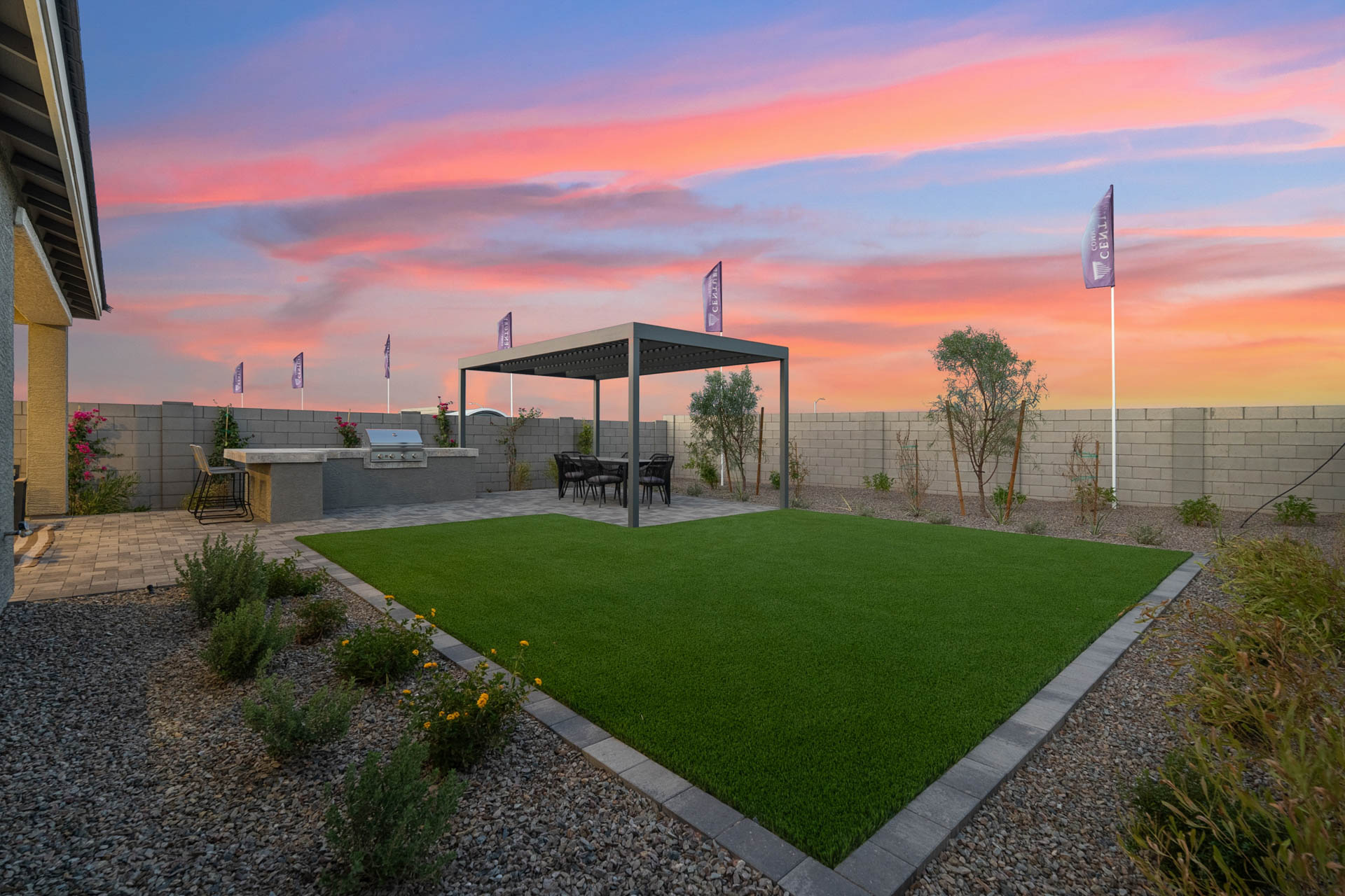 A building with a grass lawn.