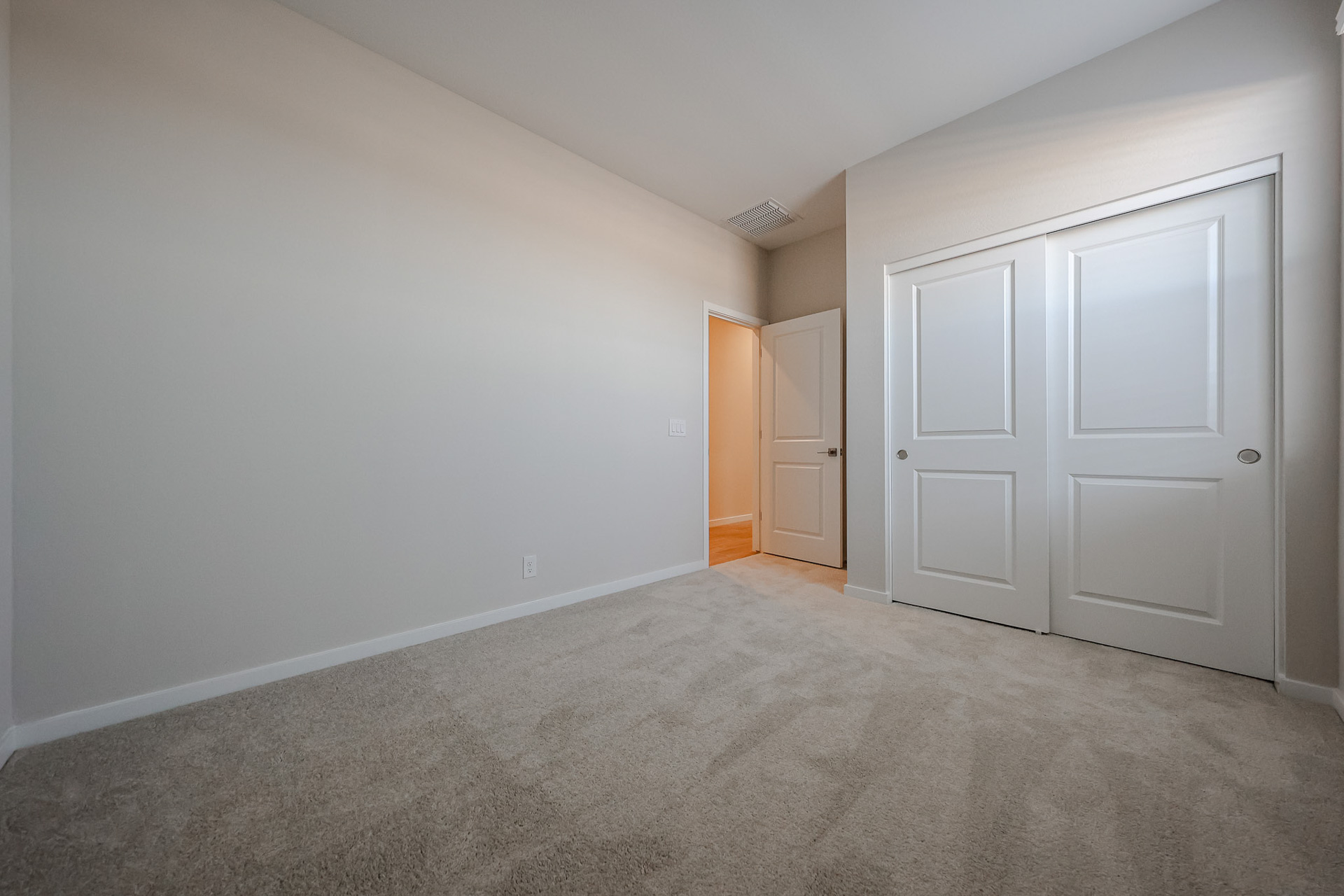 A room with white doors.
