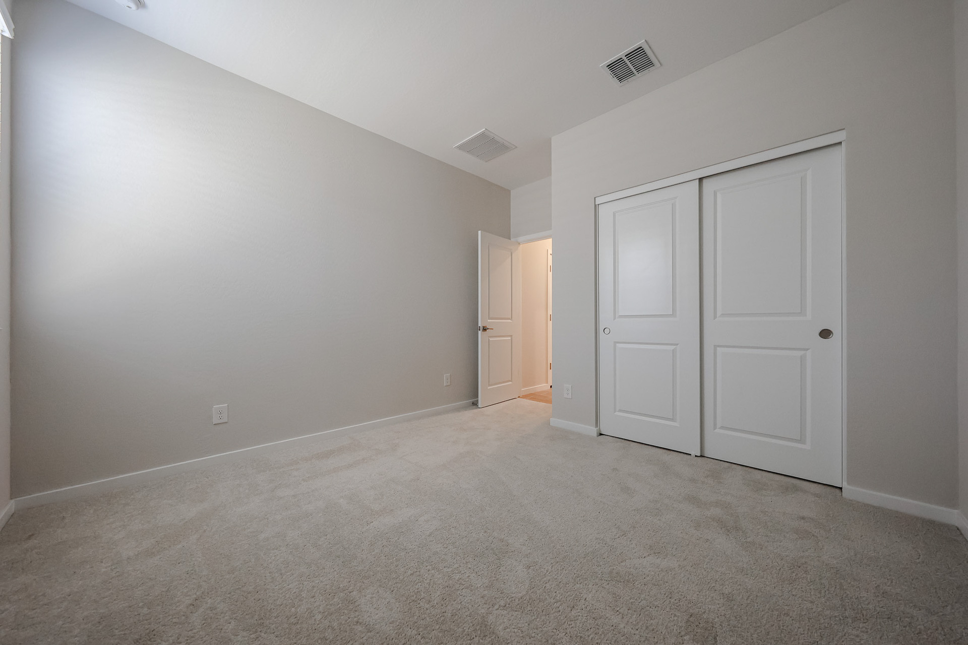 A room with white doors.