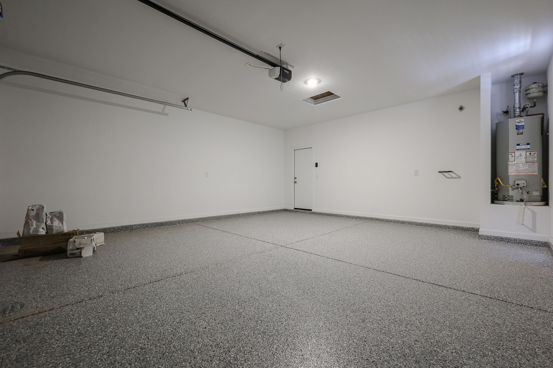 A room with a white wall and a white floor.