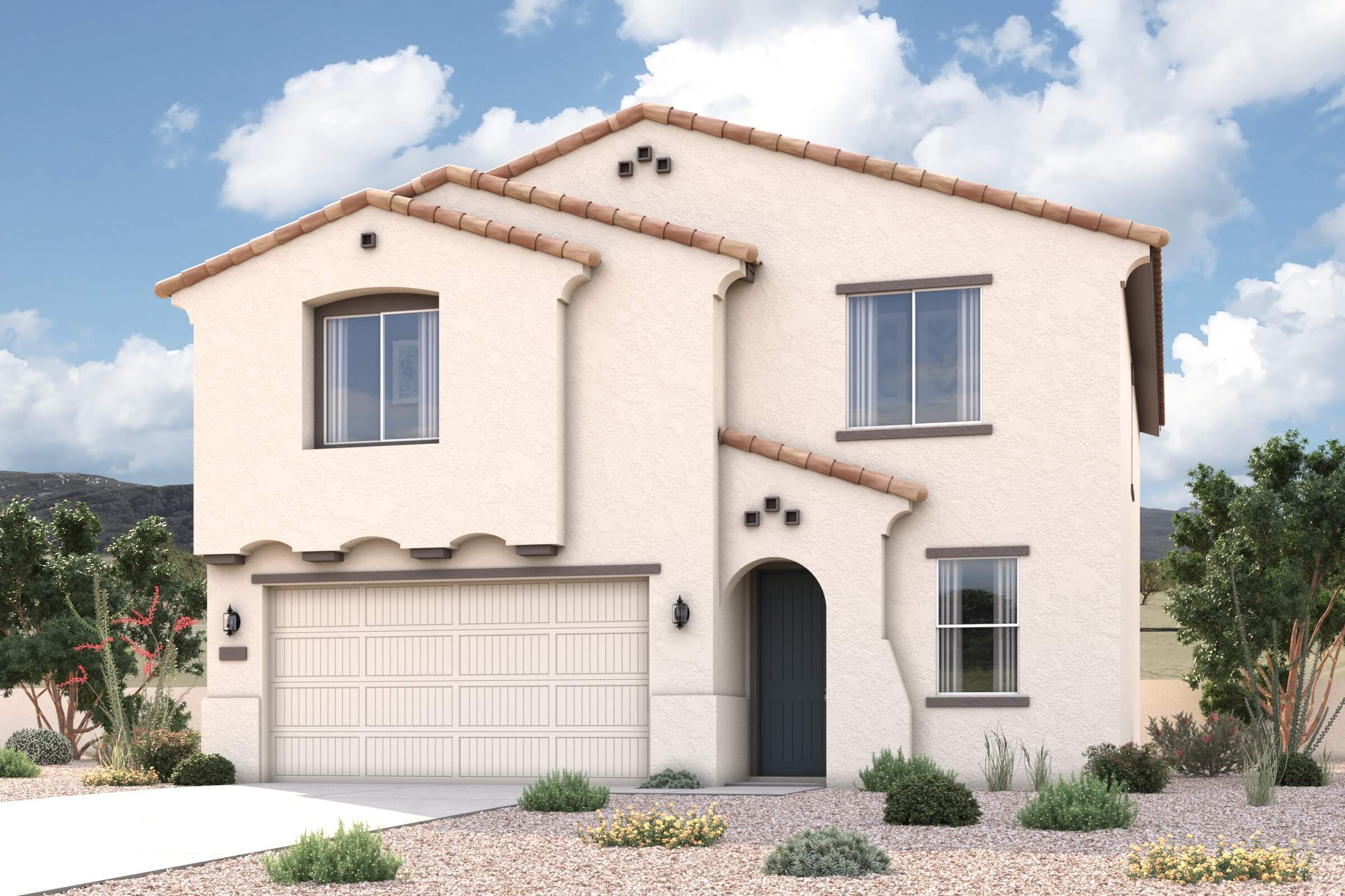 A white house with a garage.