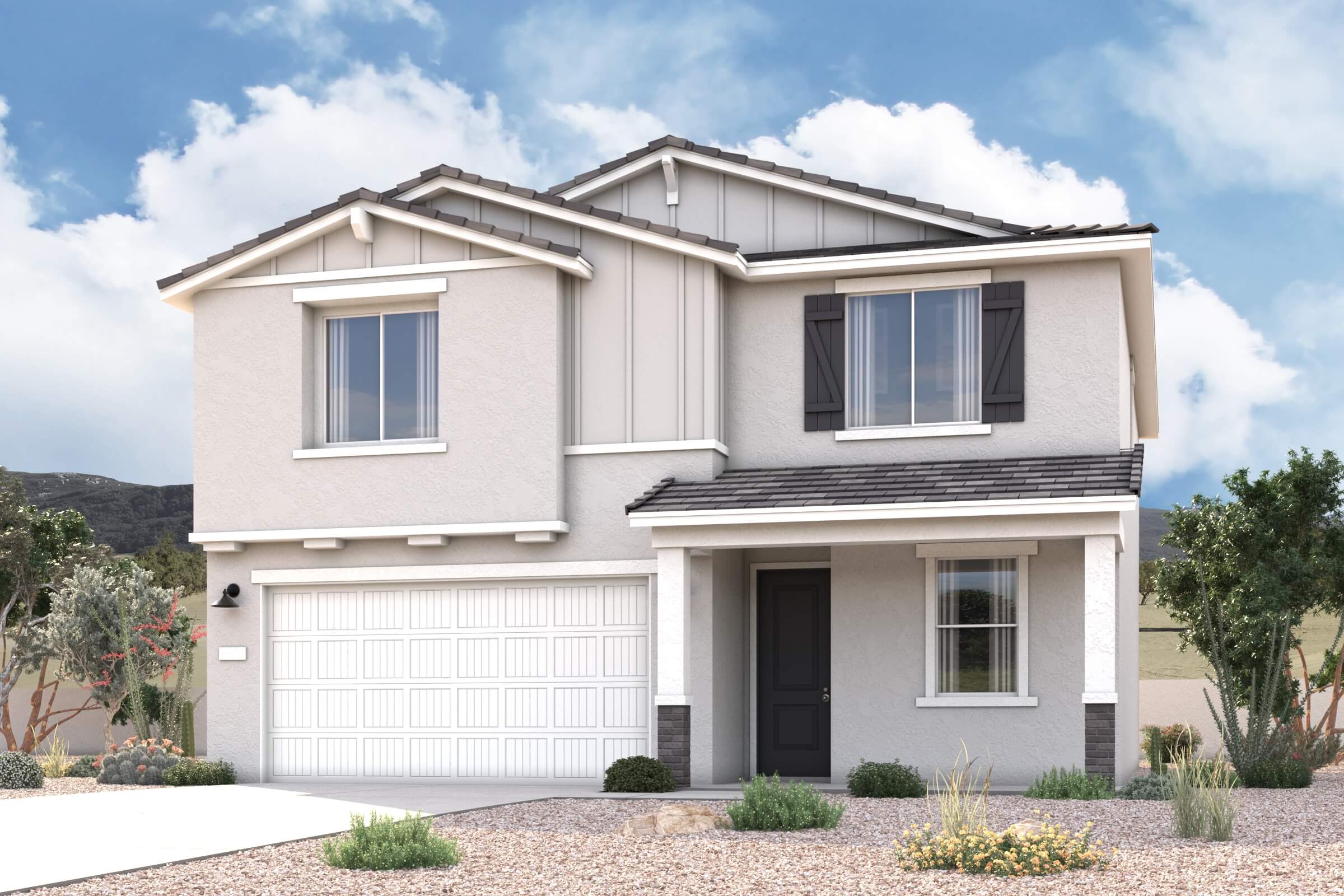 A white house with a garage.