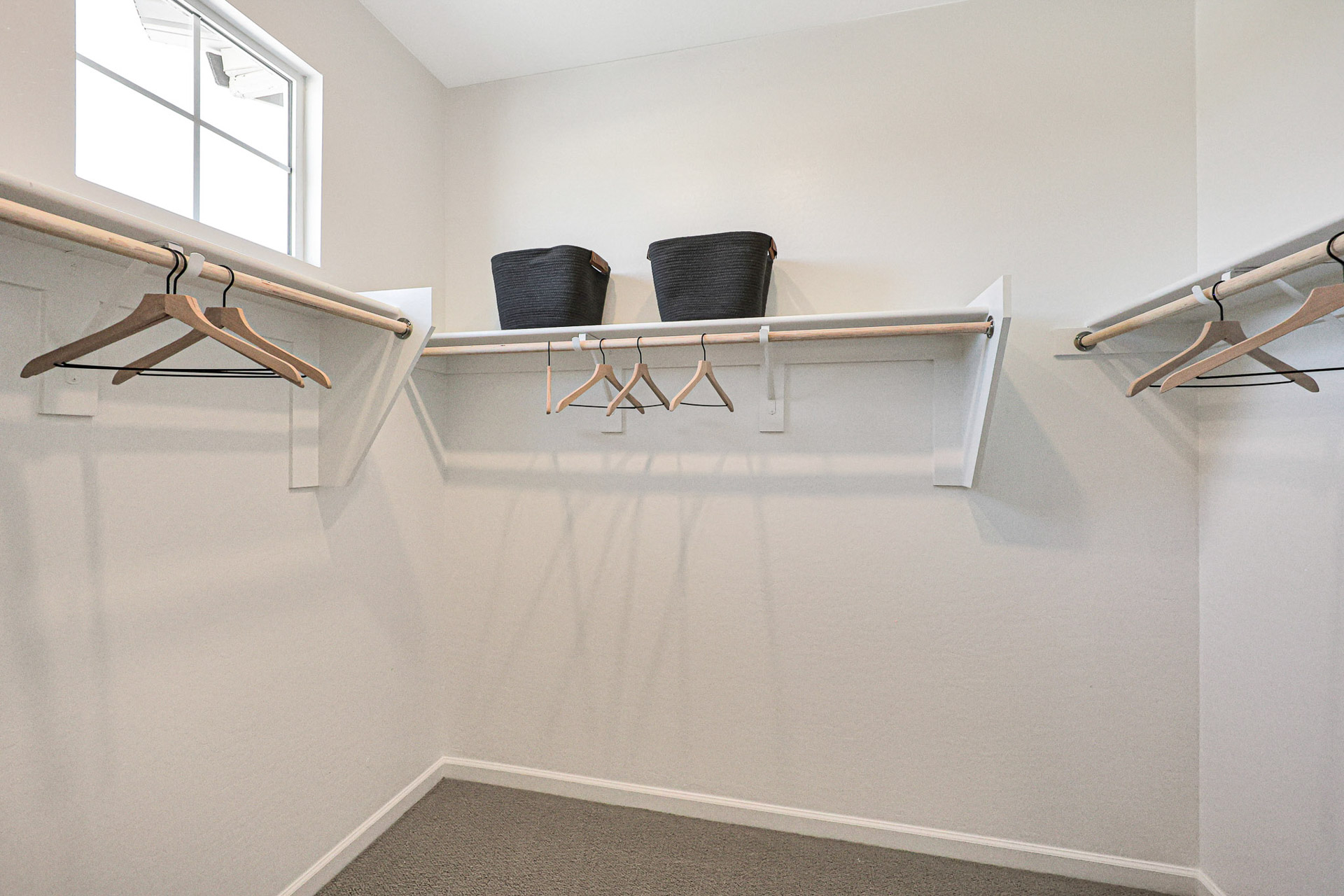 A room with a table chairs and a chair.