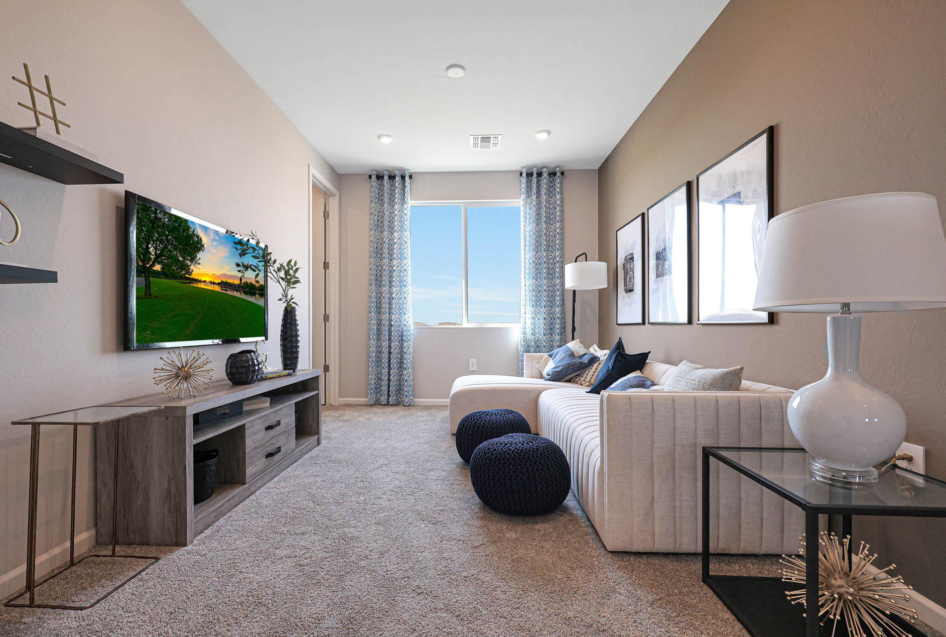 A living room with a tv and couches.