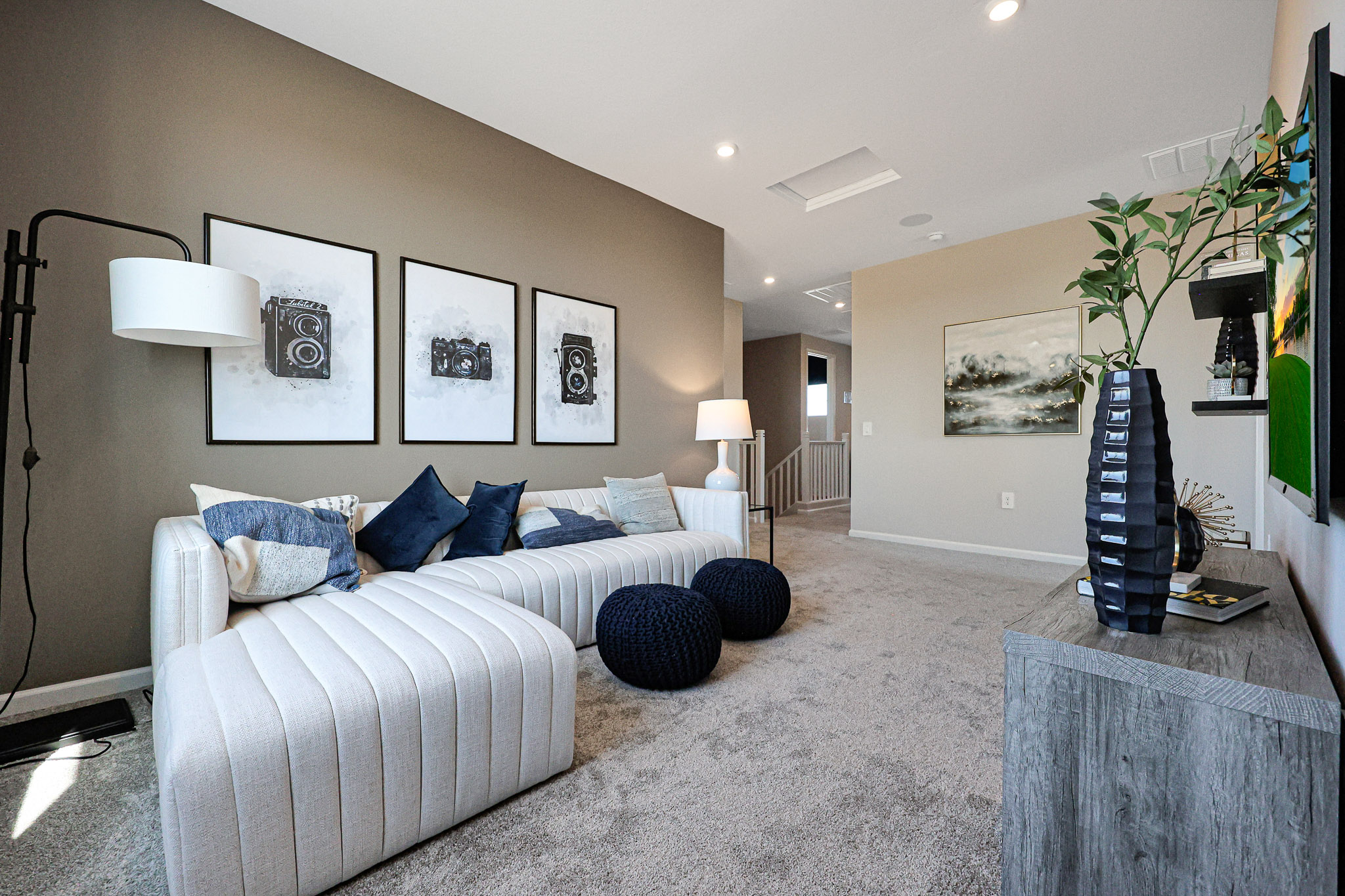 A living room with a couch and a coffee table.