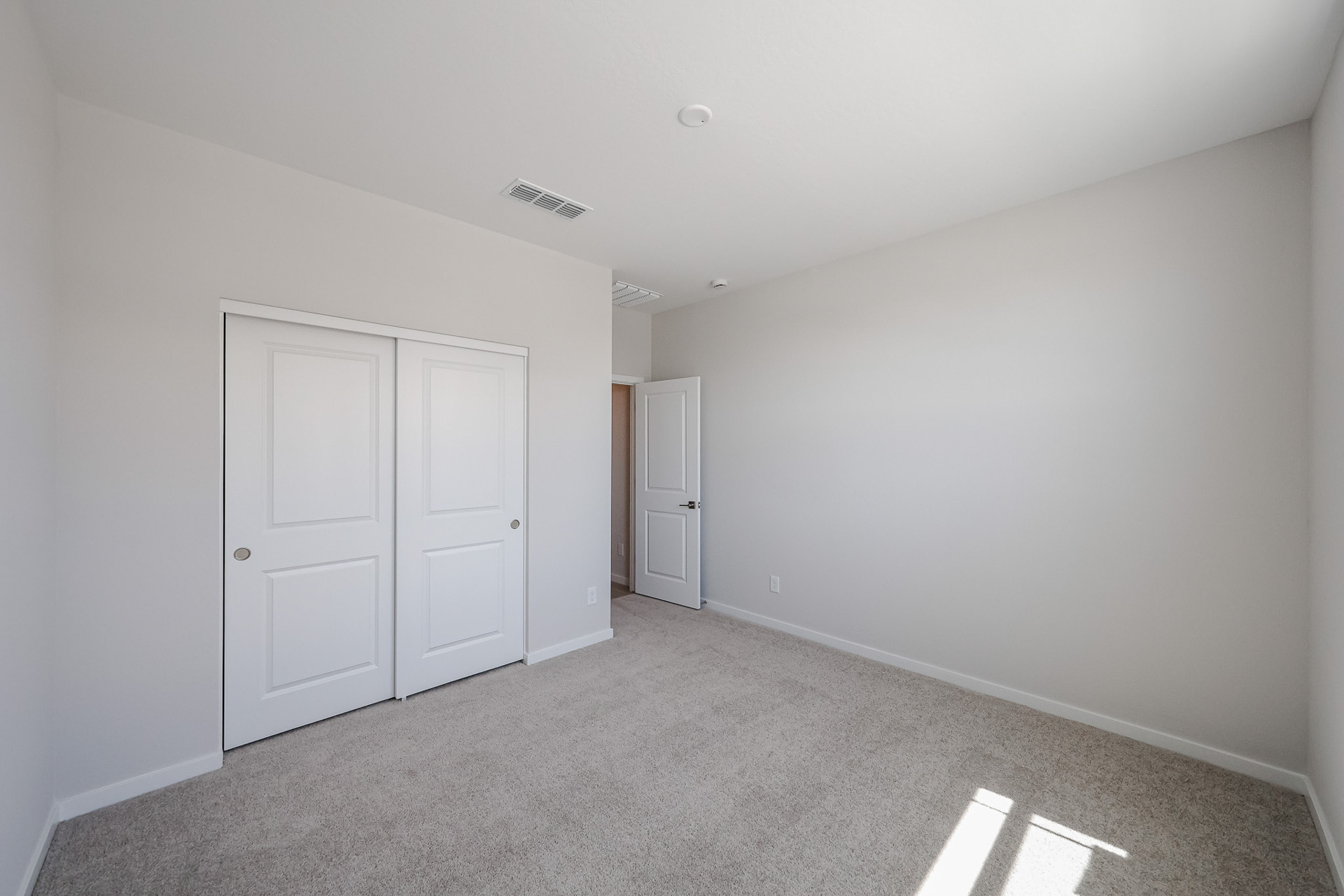 A room with white doors.