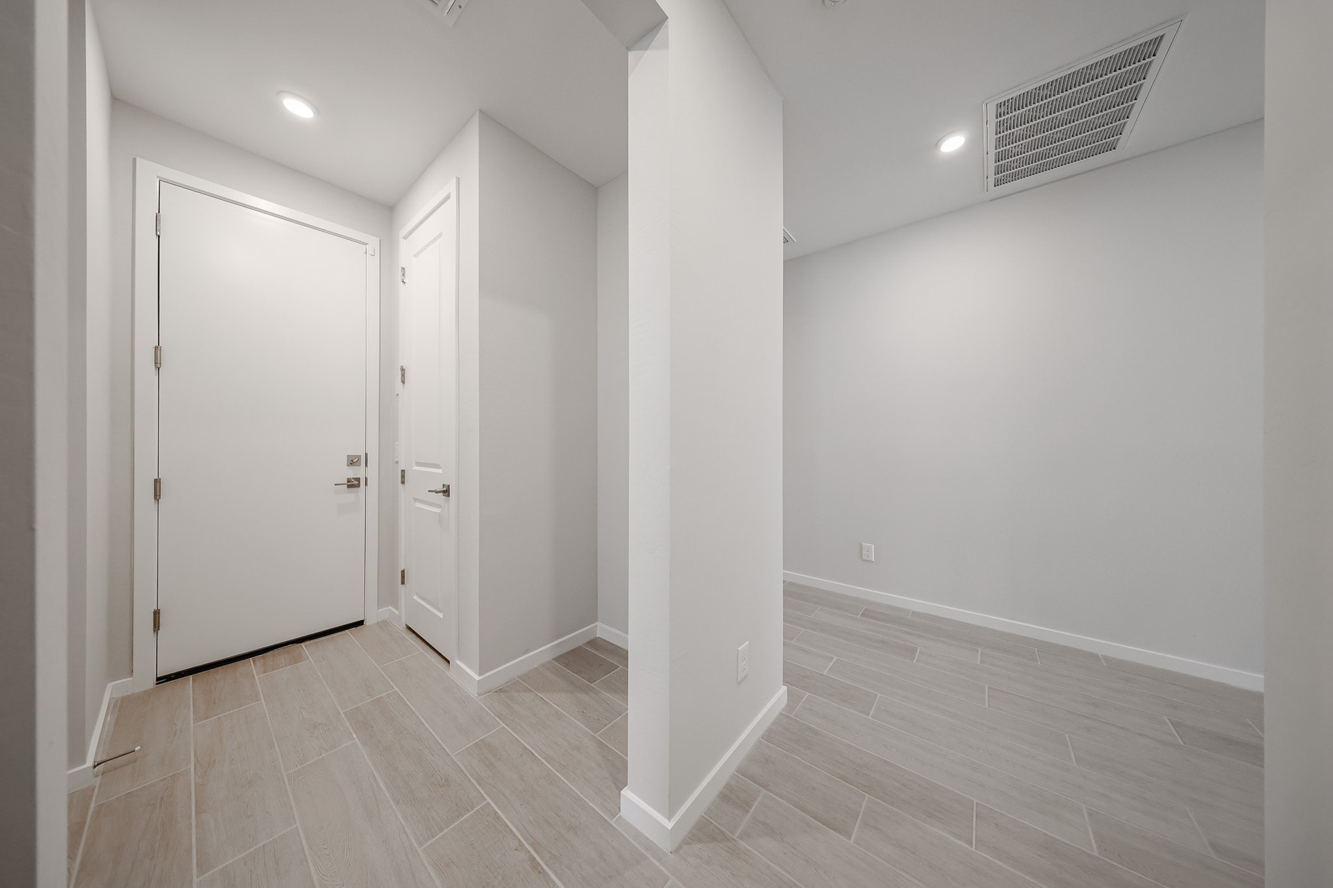 A room with white doors.