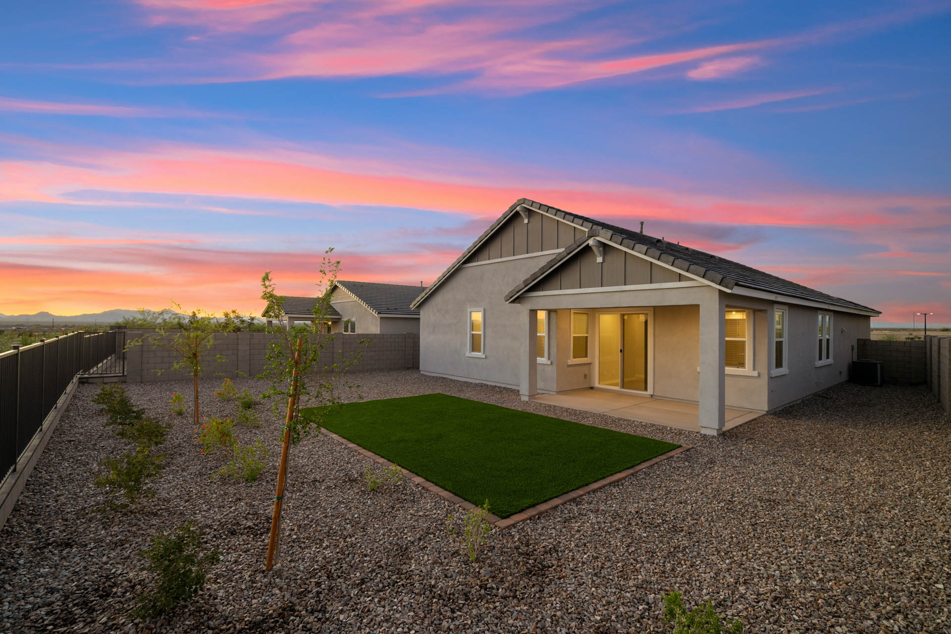 A house with a fence around it.