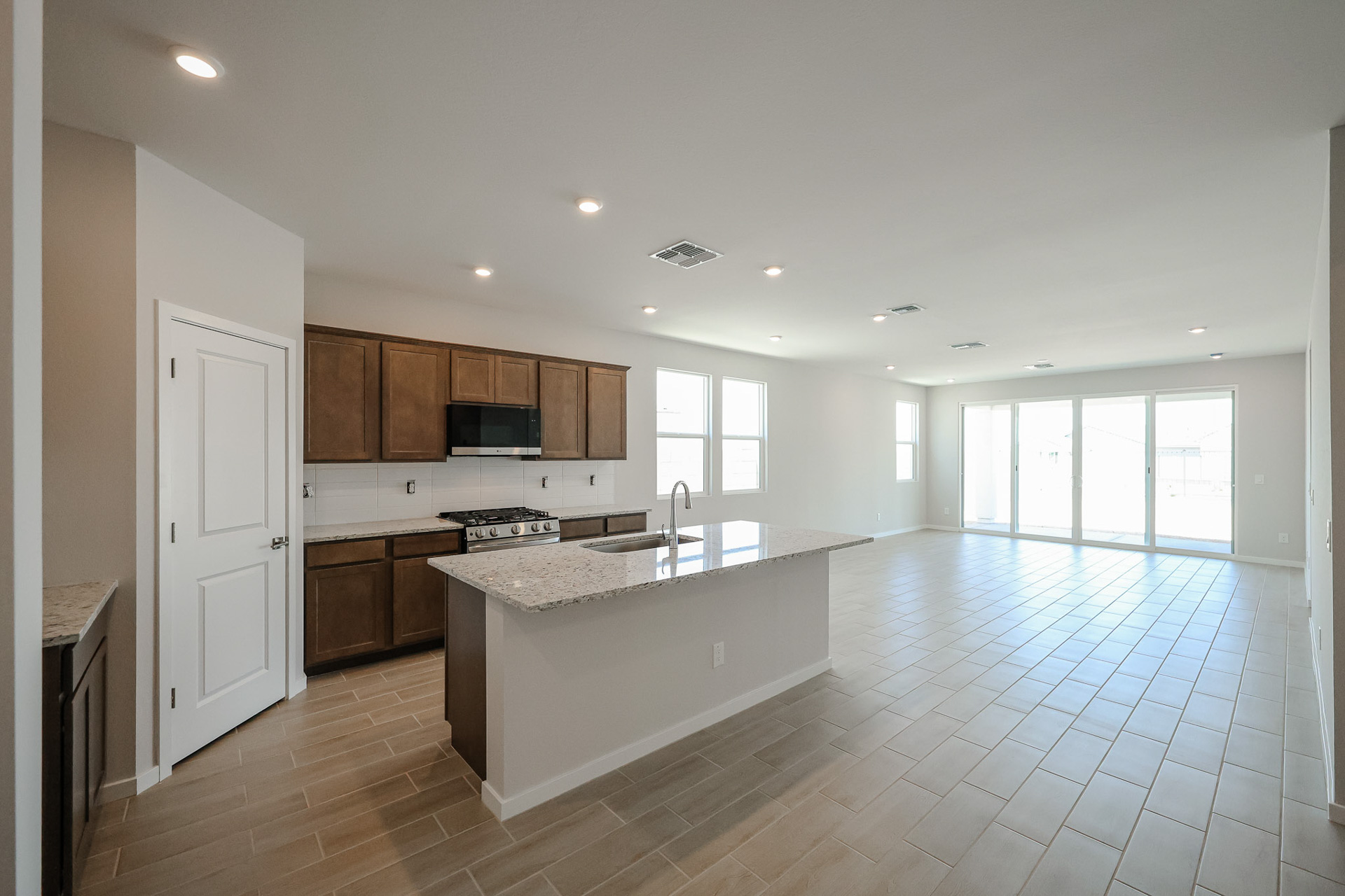 A large kitchen with a large island.