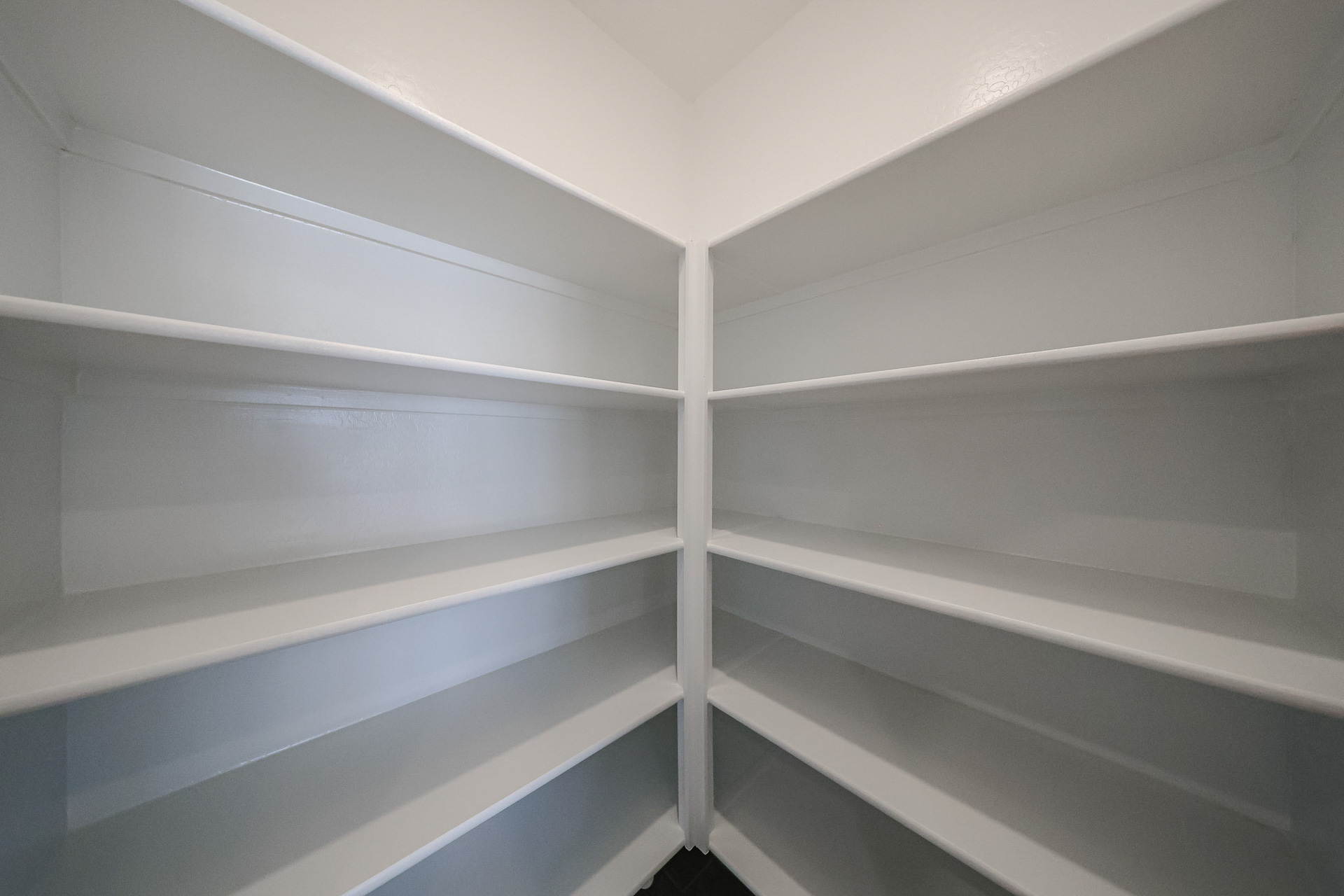 A white shelf with white shelves.