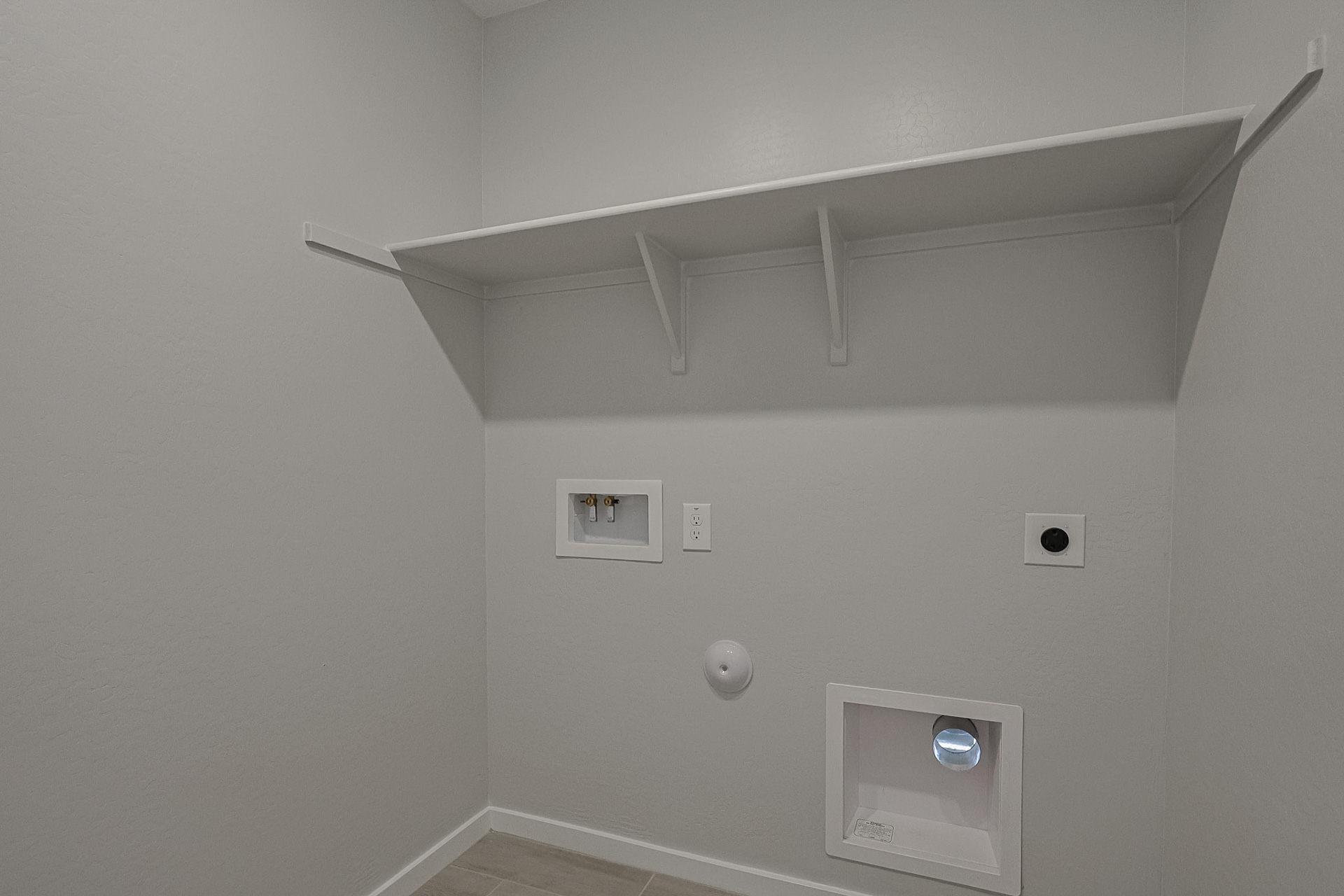 A white ceiling with a light.