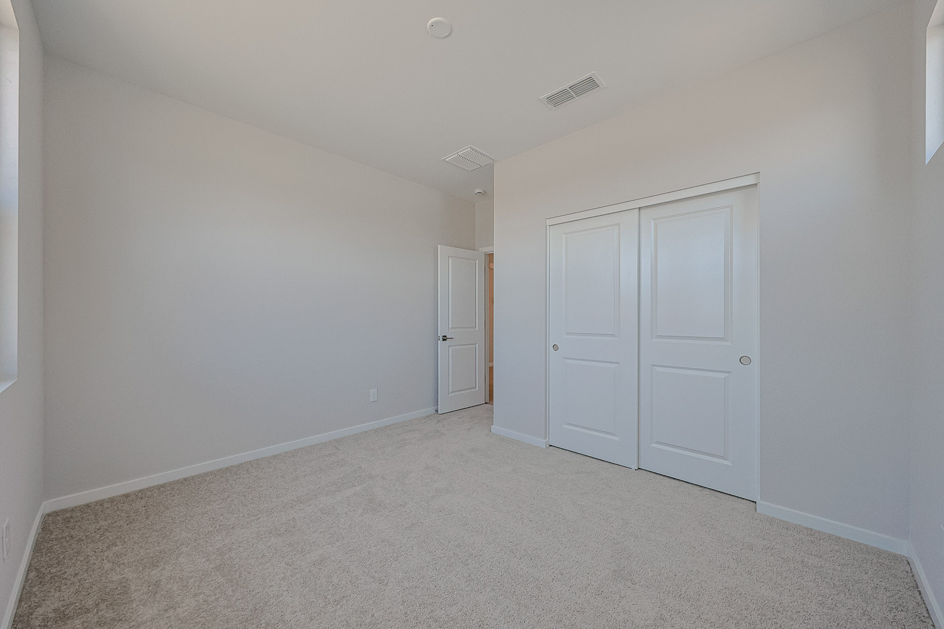A room with white doors.