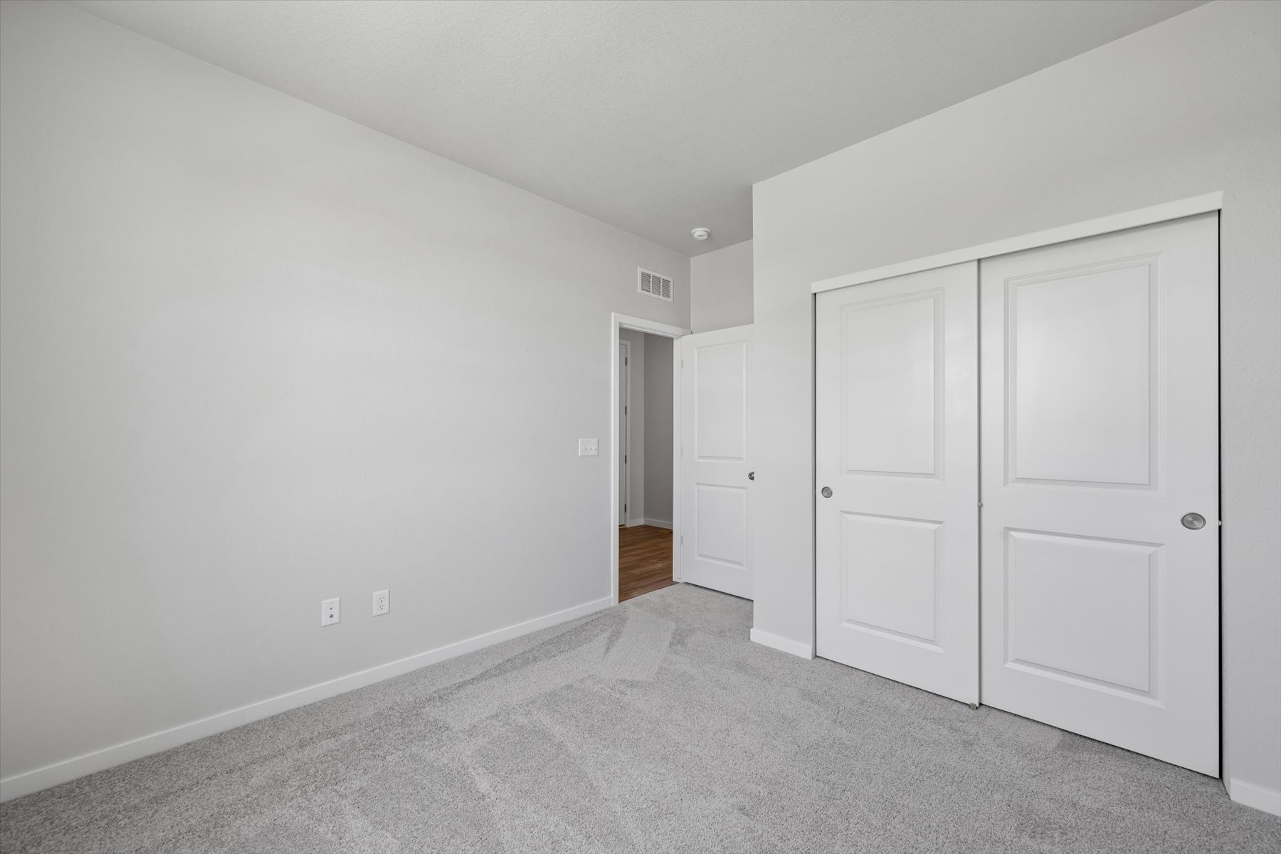 A room with white doors.