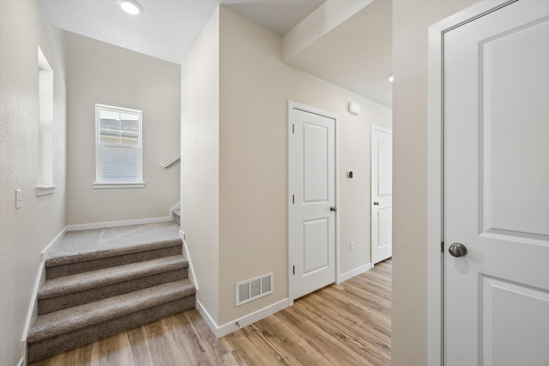A room with white doors.