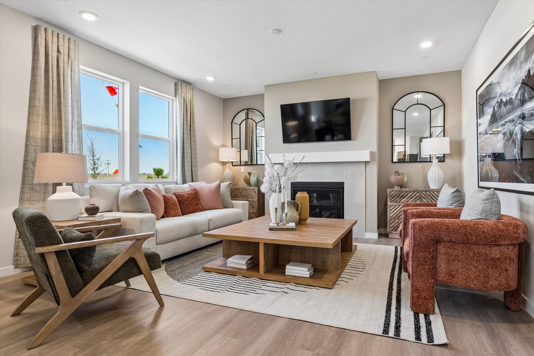 A living room with a fireplace.