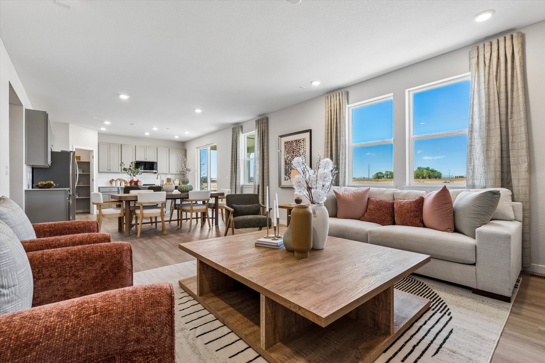 A living room with a large window.