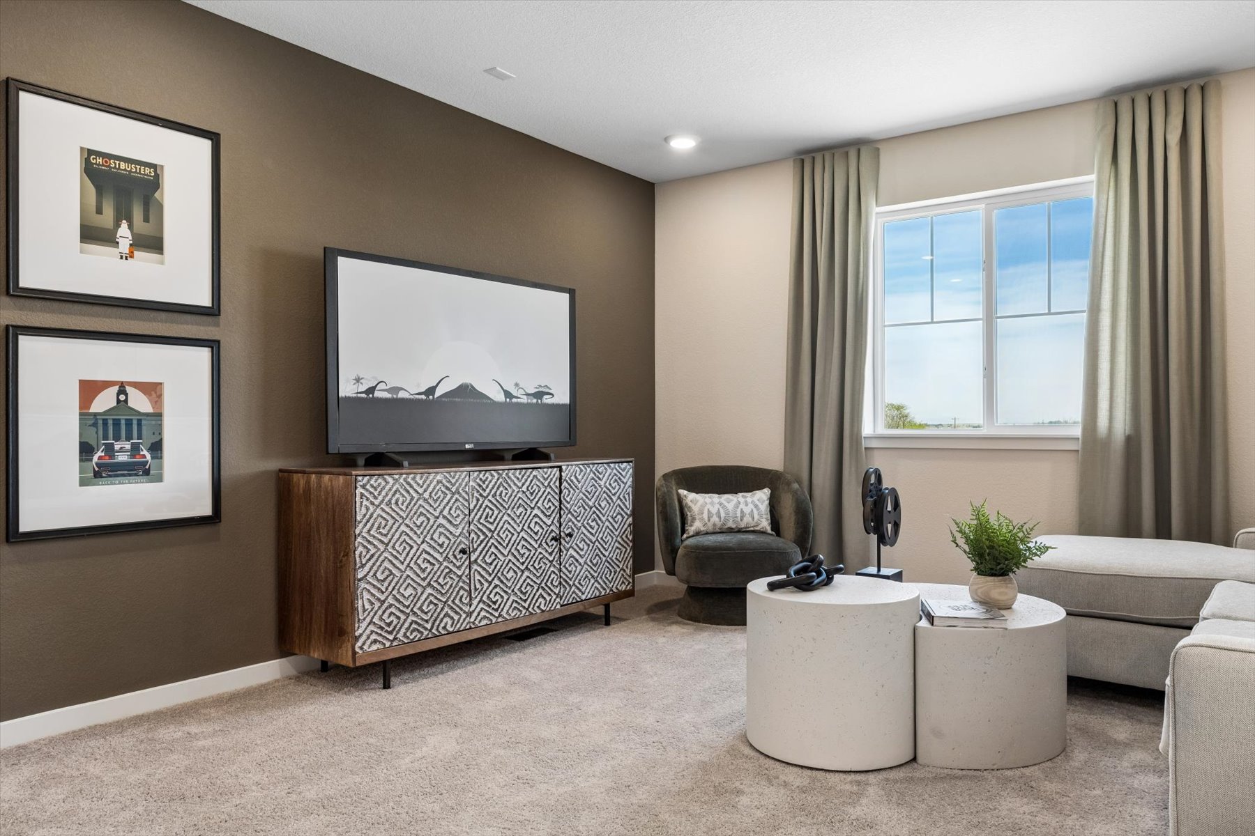 A living room with a tv and couches.