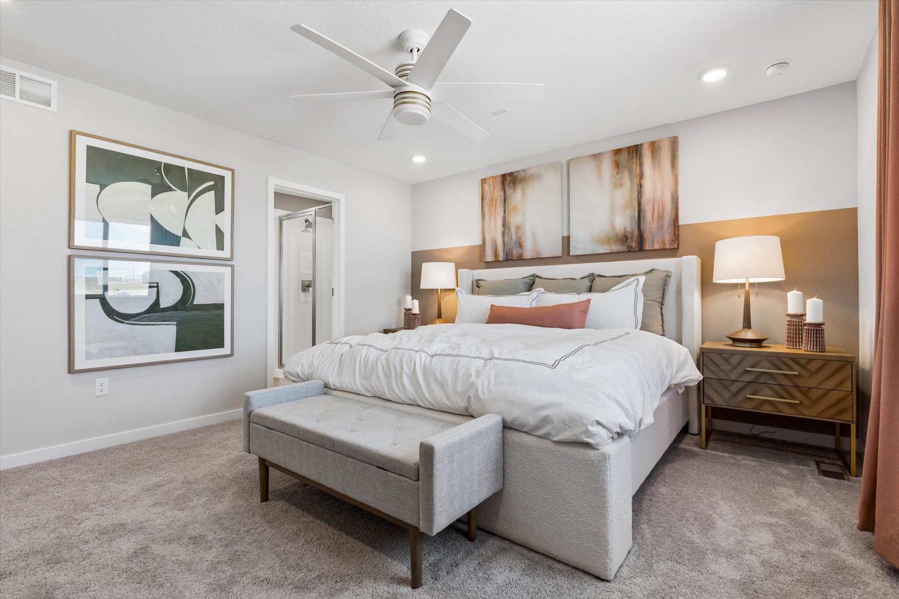 A bedroom with a bed and a couch.