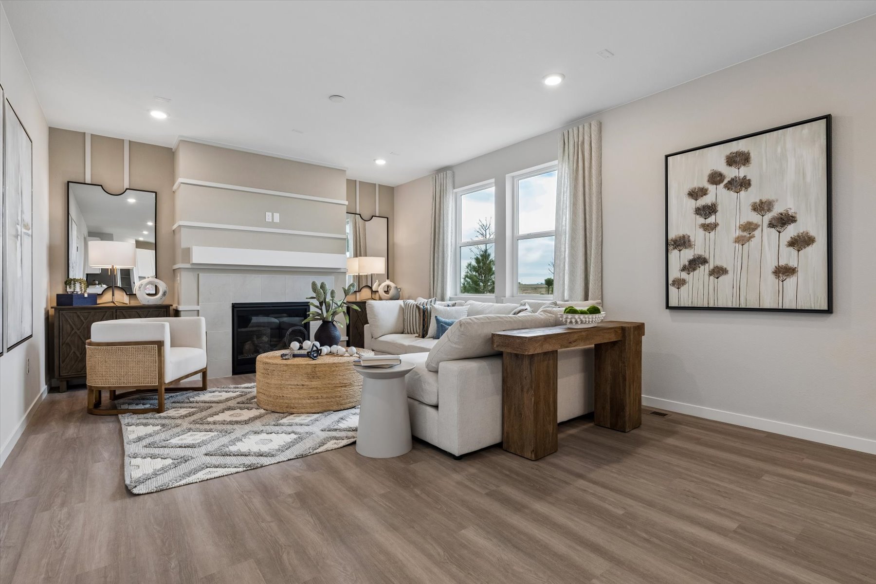 A living room with a fireplace.