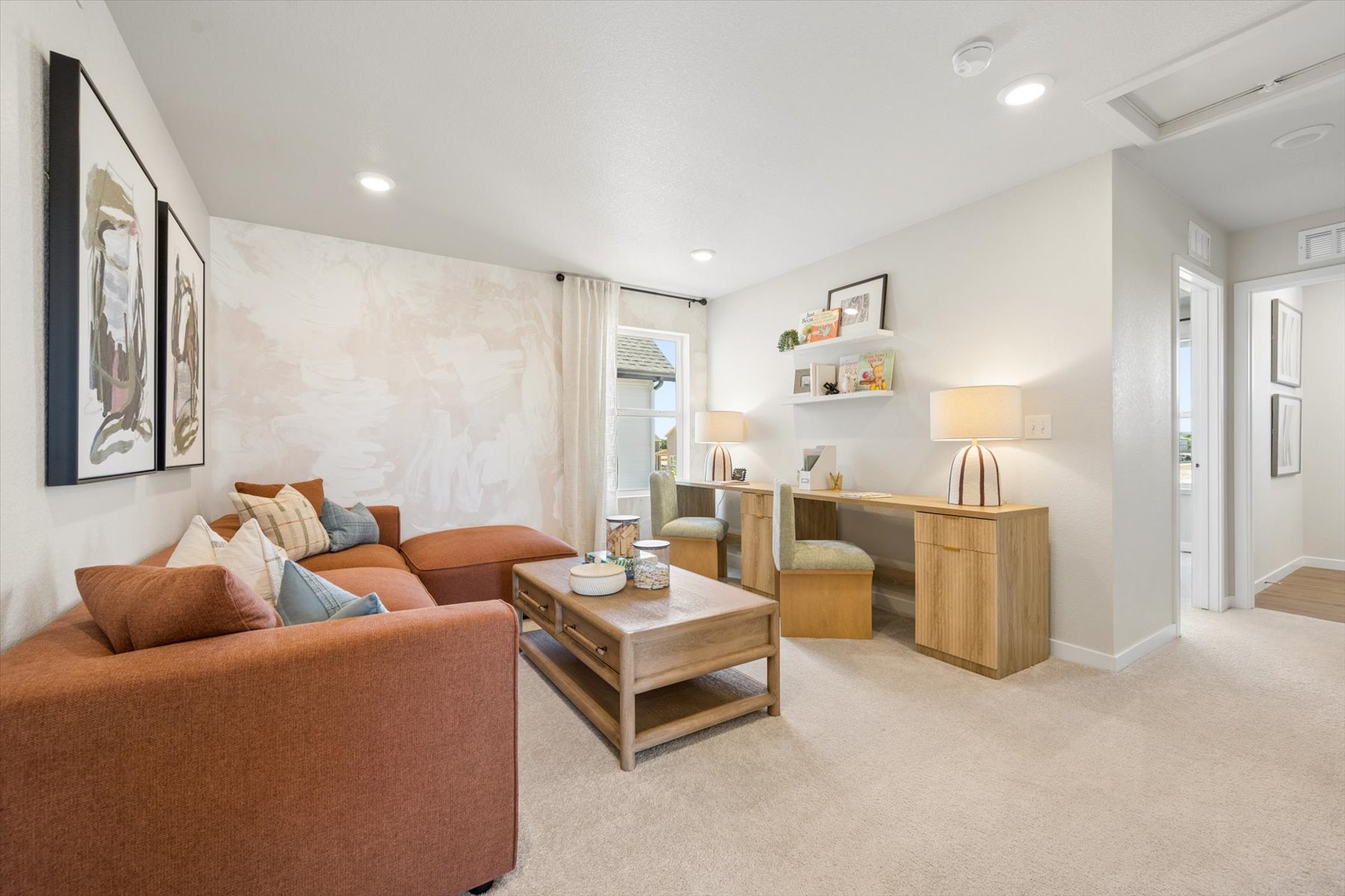 A living room with a couch and a coffee table.