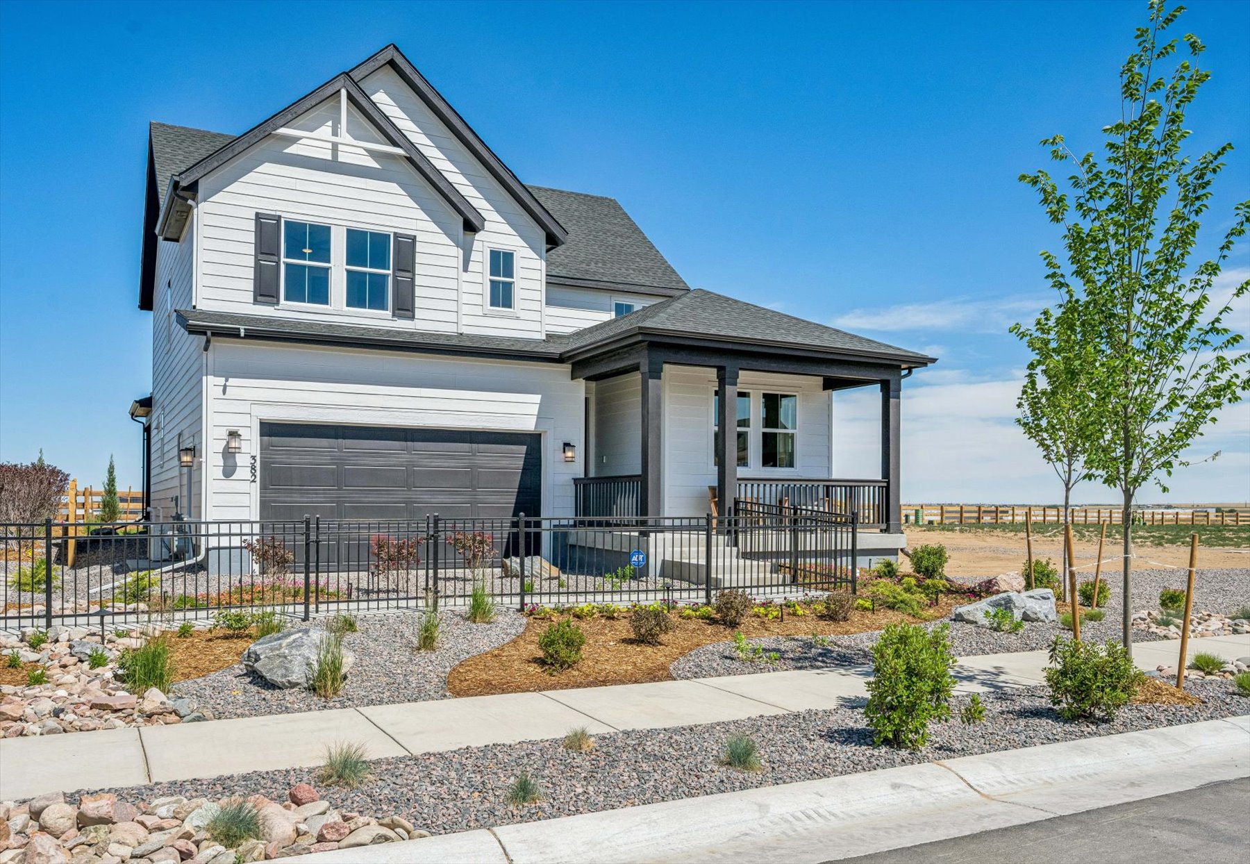 A house with a fence around it.
