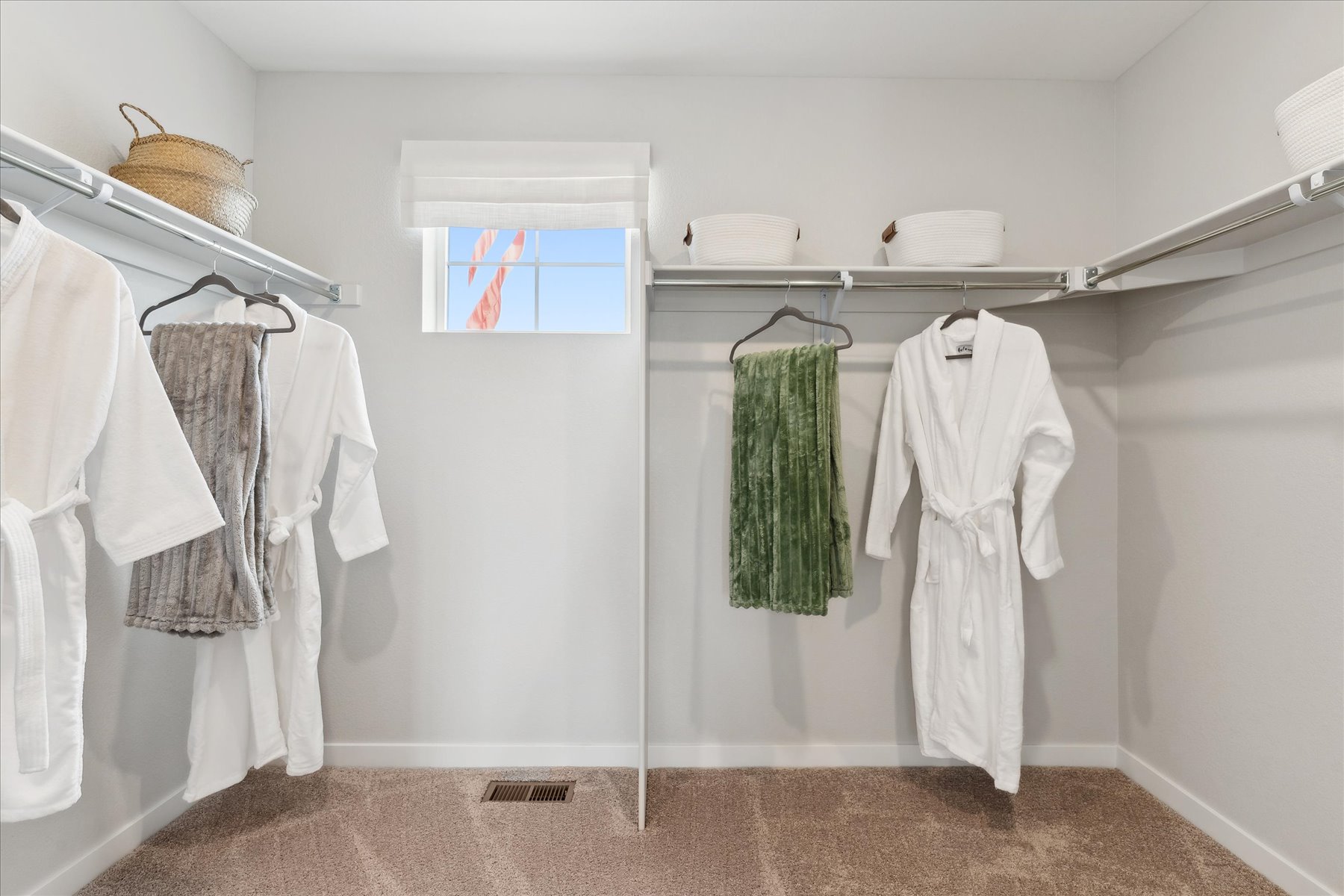 A bathroom with white clothes.