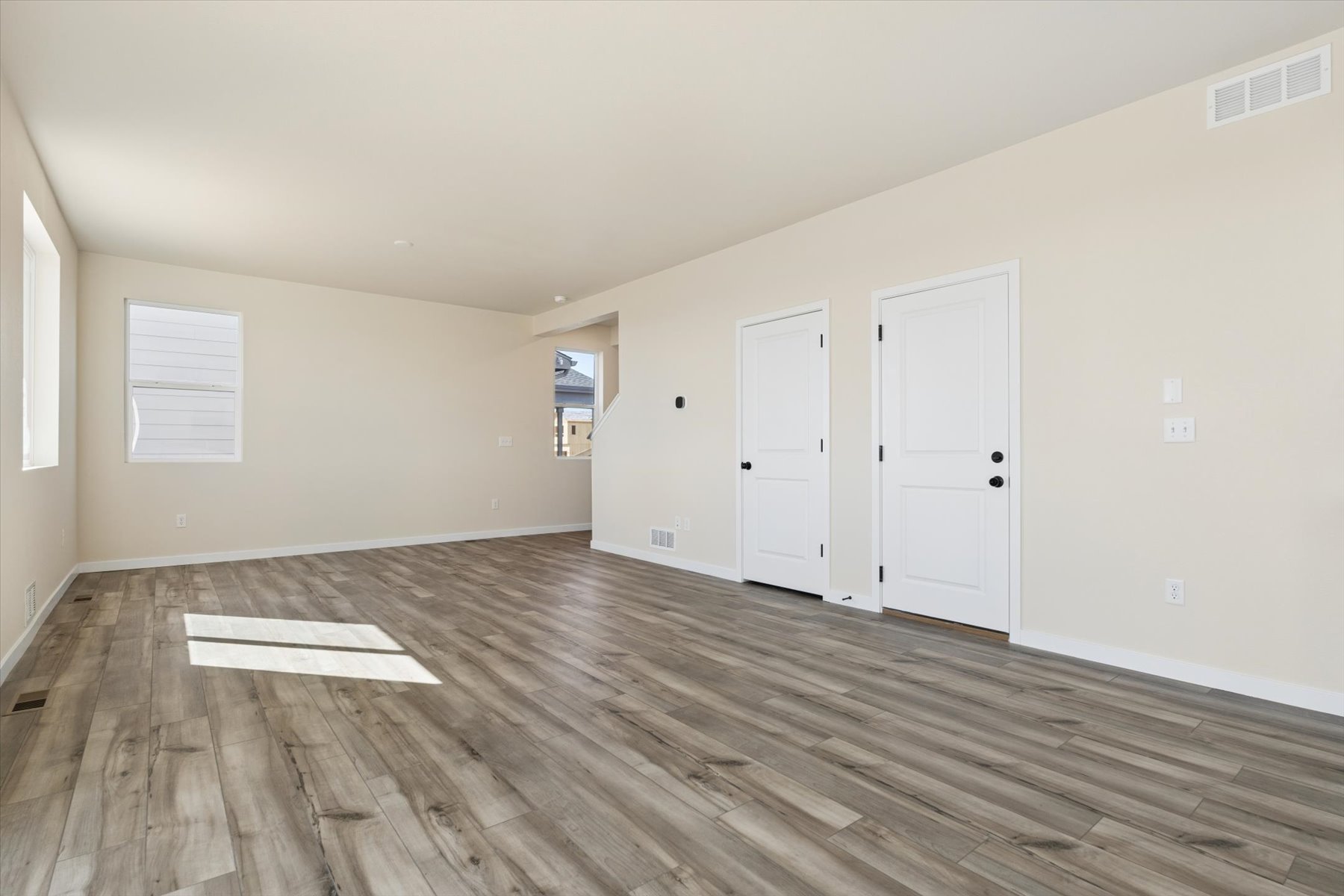 A room with white doors.