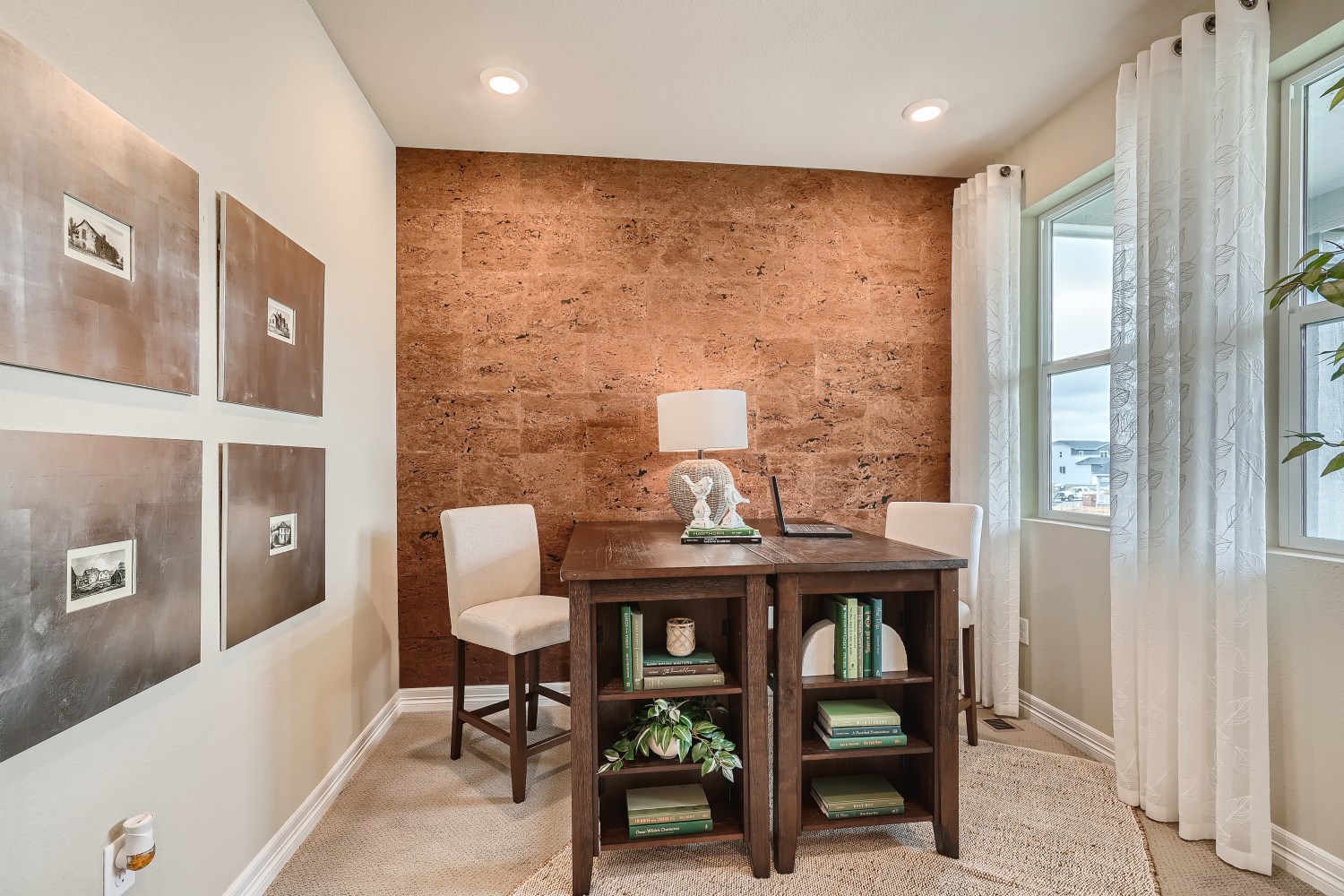 A room with a table and chairs.