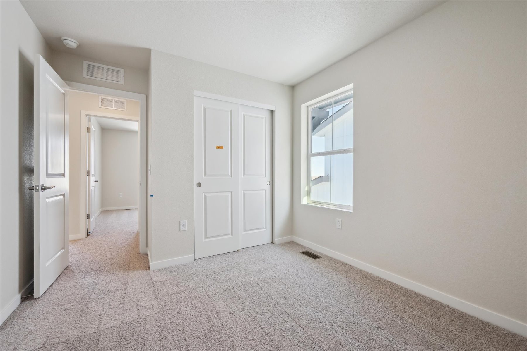 A room with white doors.
