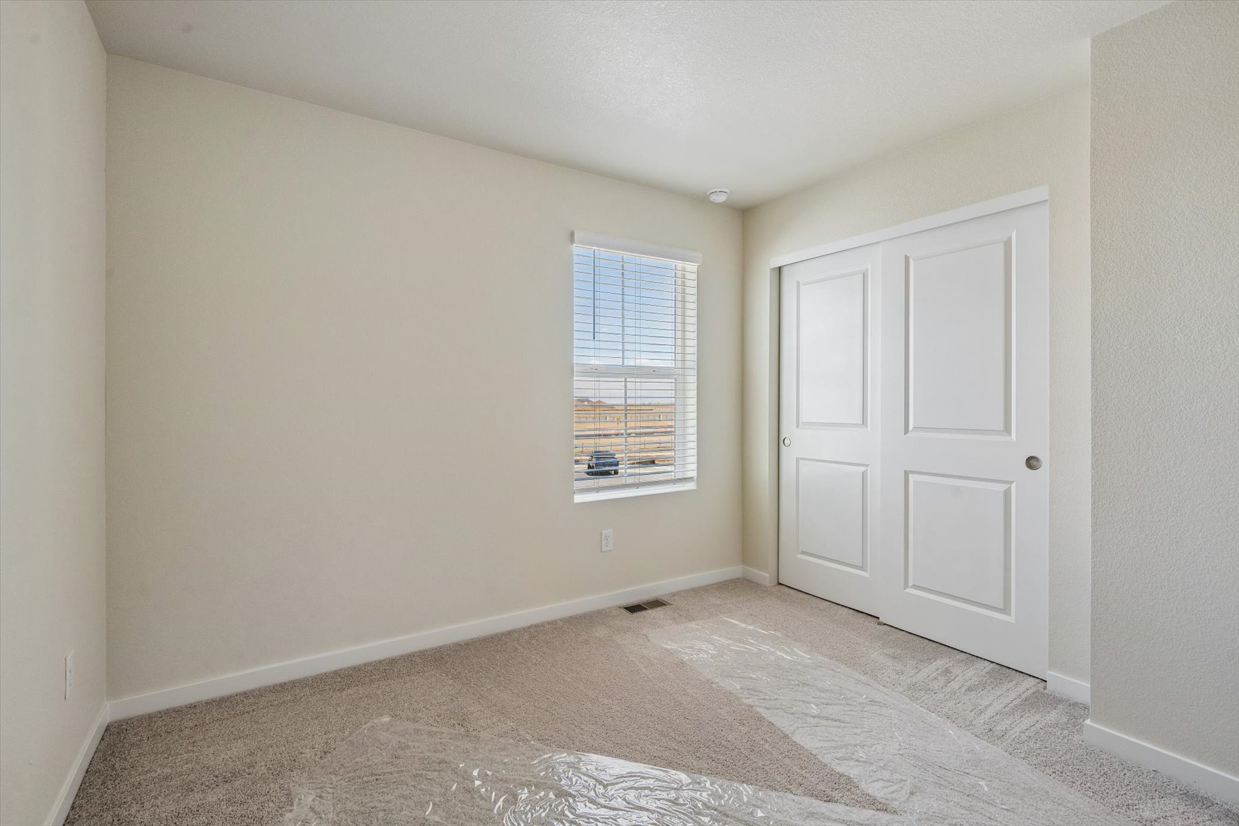 A room with white doors.