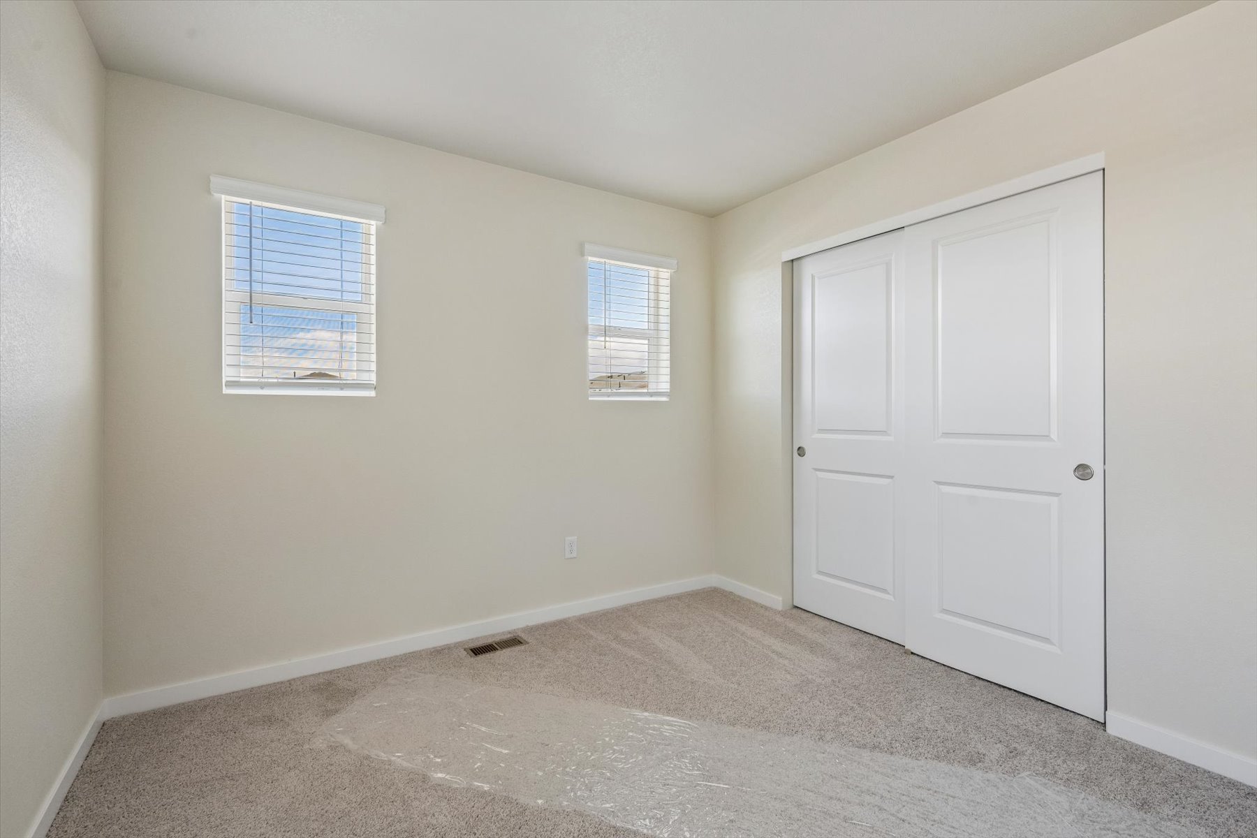 A room with white doors.