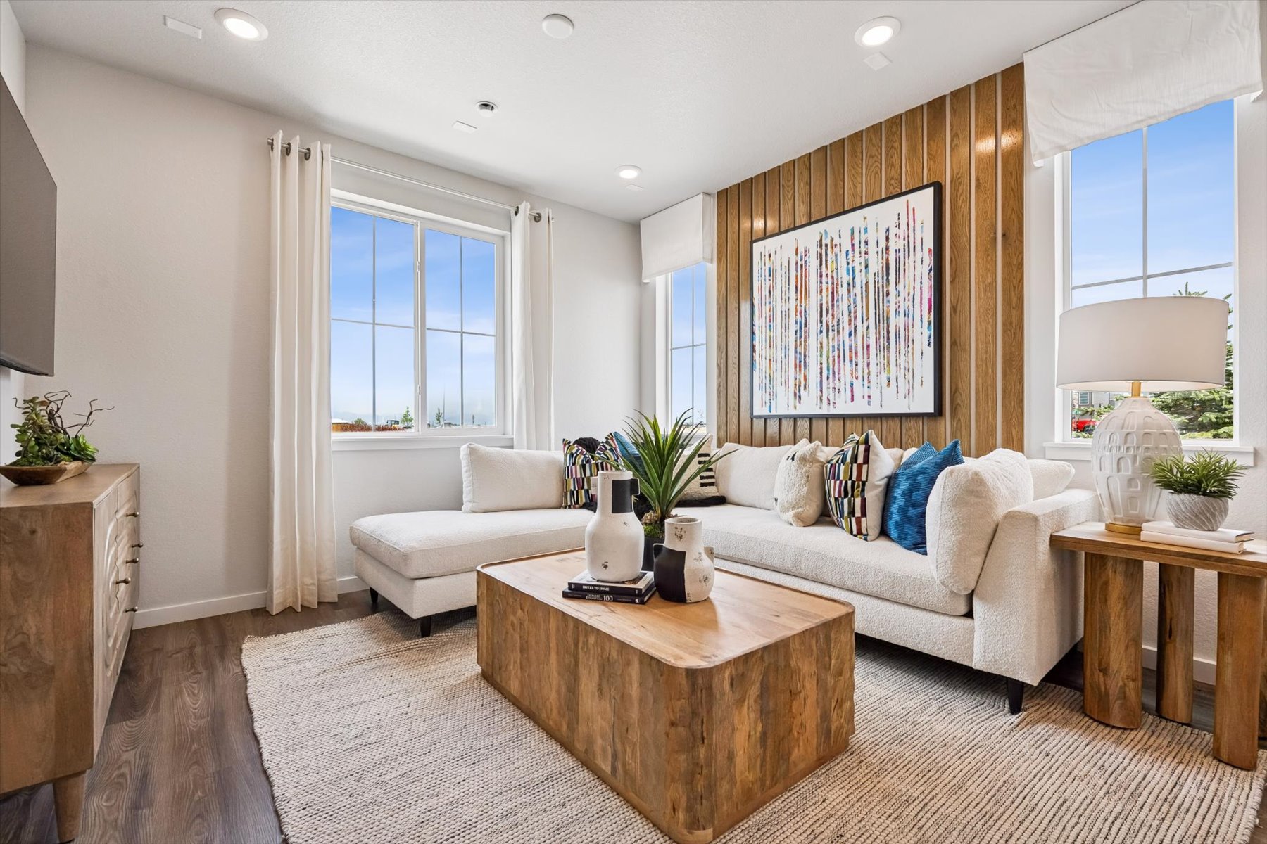 A living room with a couch and a coffee table.