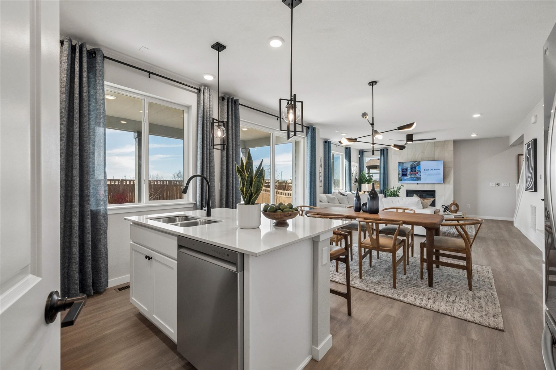 A kitchen with a bar and dining area.