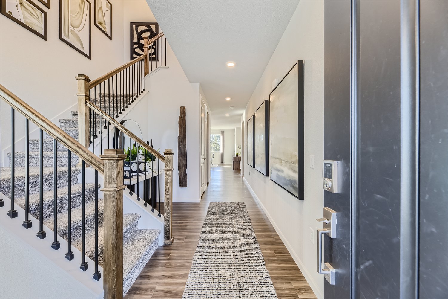 A hallway with white walls.