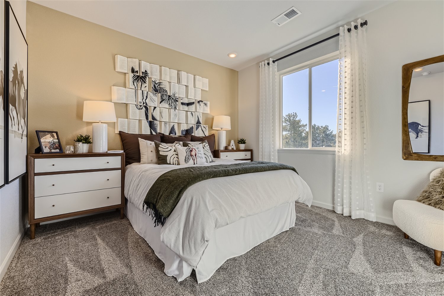 A bedroom with a large bed.