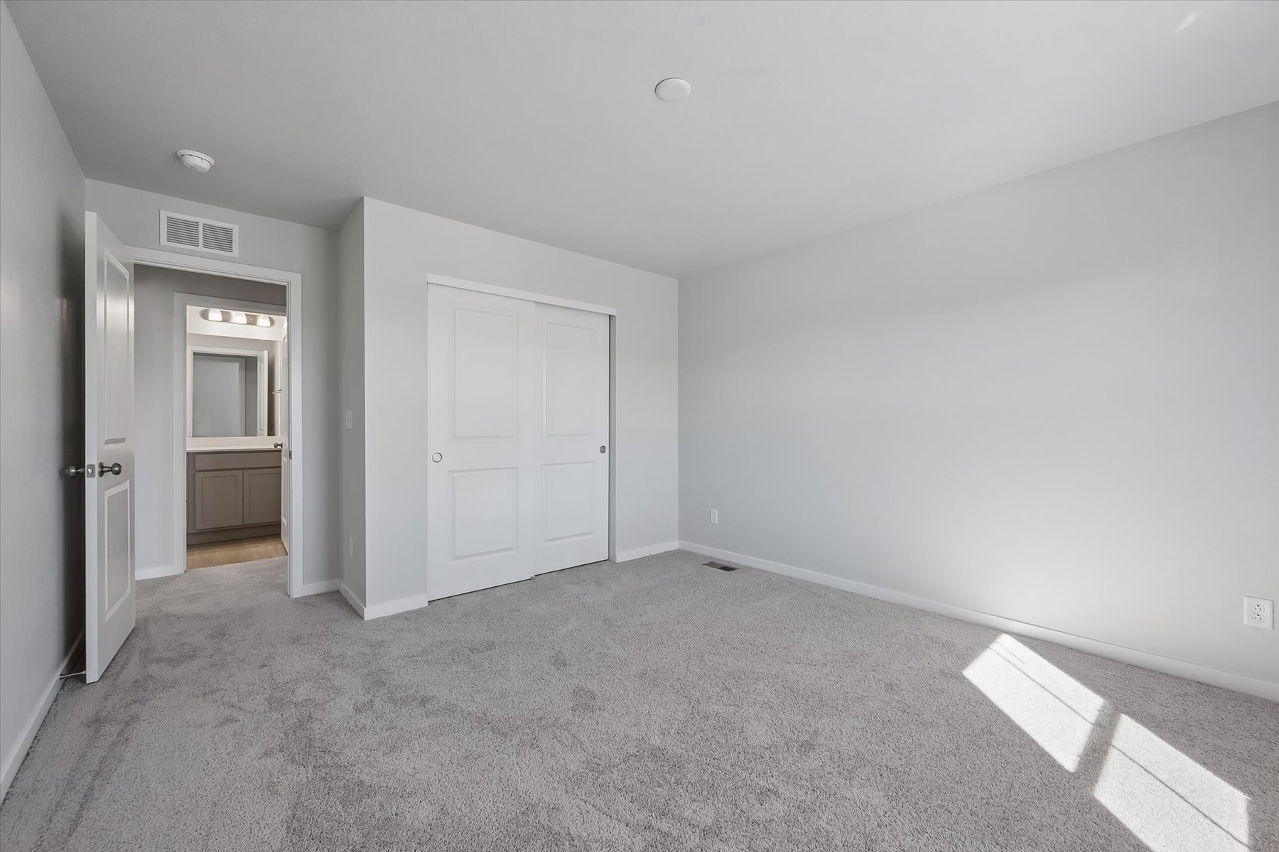 A room with white doors.