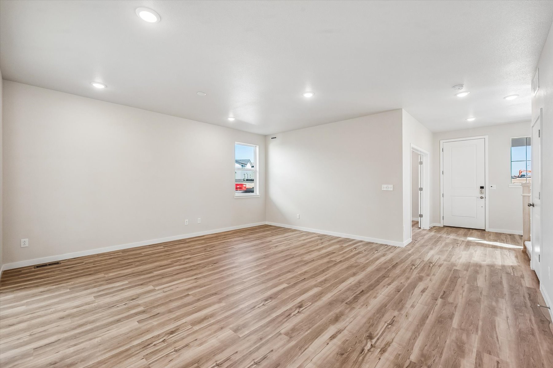 A room with wood floors.