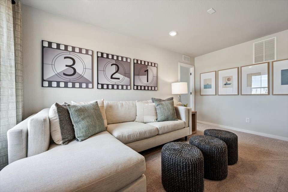 A living room with a couch and a coffee table.