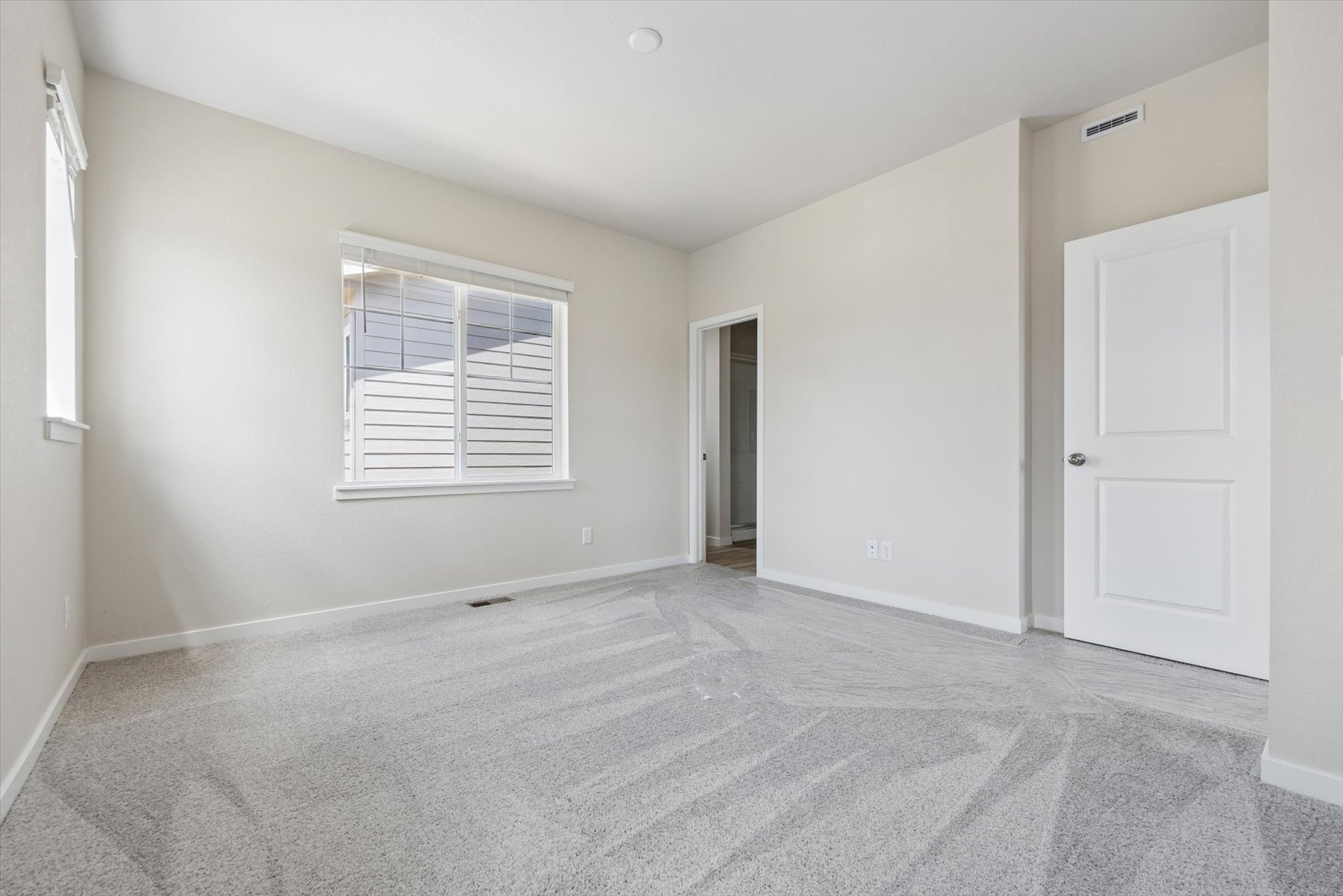 A room with white doors.