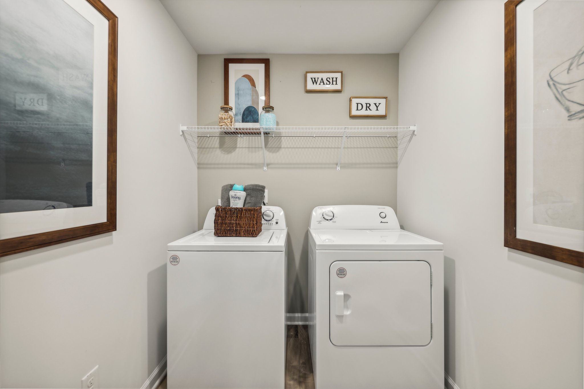 A laundry room with a washer and dryer.